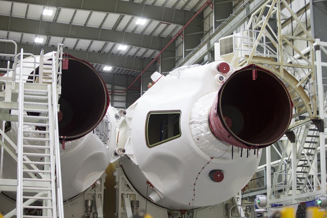 CAPE CANAVERAL, Fla. – The United Launch Alliance Delta IV port booster is being mated to the core booster inside the Horizontal Integration Facility at Space Launch Complex 37 on Cape Canaveral Air Force Station in Florida. The Delta IV Heavy rocket will launch an uncrewed Orion spacecraft on Exploration Flight Test-1. During the mission, Orion will travel farther into space than any human spacecraft has gone in more than 40 years. The data gathered during the flight will influence design decisions, validate existing computer models and innovative new approaches to space systems development, as well as reduce overall mission risks and costs for later Orion flights. Liftoff of Orion on the first flight test is planned for December 2014. Photo credit: NASA/Ben Smegelsky