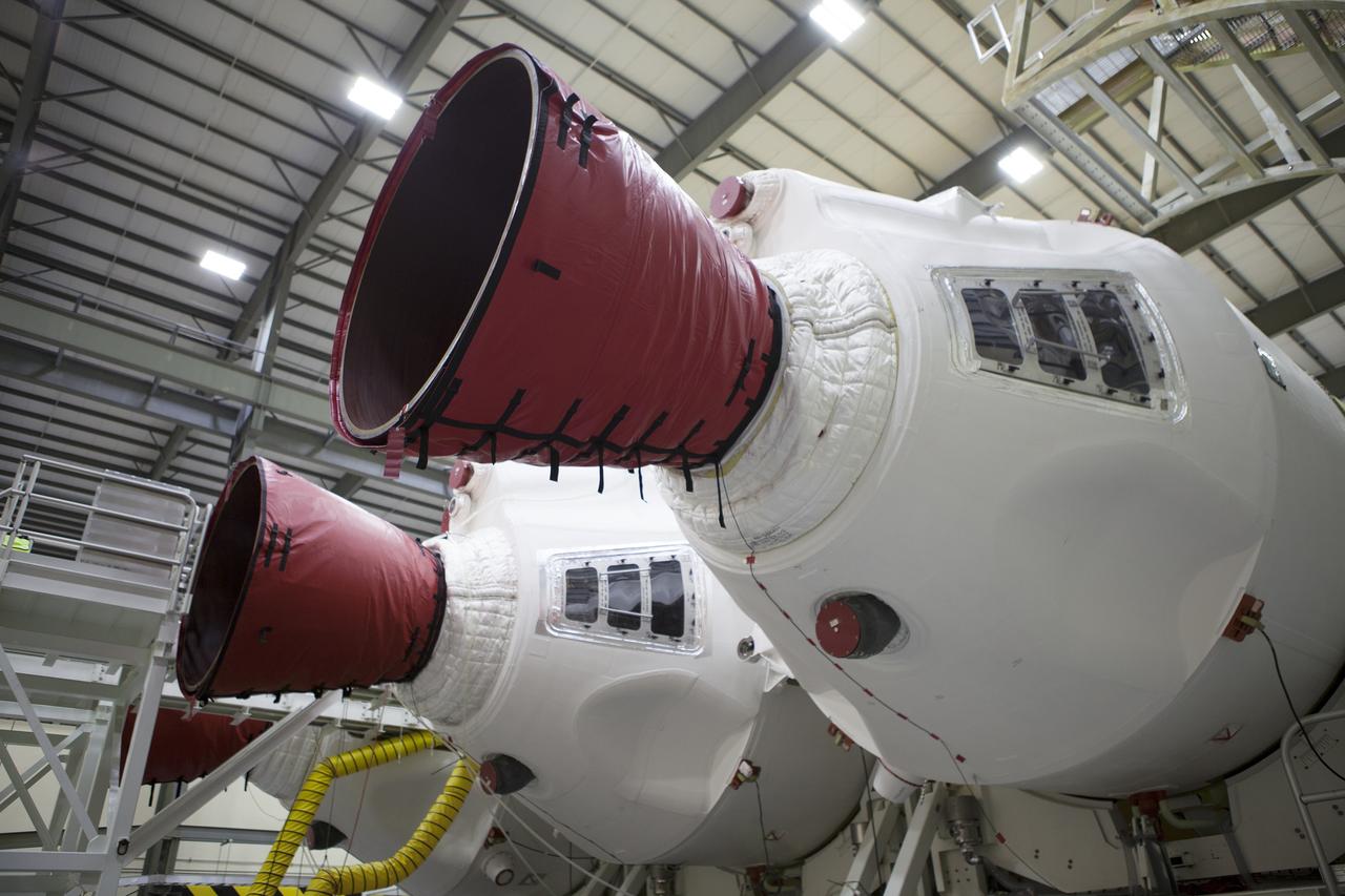 CAPE CANAVERAL, Fla. – All three of the United Launch Alliance, or ULA, Delta IV boosters for Exploration Flight Test-1 are in view inside the Horizontal Integration Facility at Space Launch Complex 37 on Cape Canaveral Air Force Station in Florida. The port booster is being mated to the core booster. The ULA Delta IV Heavy rocket will launch an uncrewed Orion spacecraft on Exploration Flight Test-1. During the mission, Orion will travel farther into space than any human spacecraft has gone in more than 40 years. The data gathered during the flight will influence design decisions, validate existing computer models and innovative new approaches to space systems development, as well as reduce overall mission risks and costs for later Orion flights. Liftoff of Orion on the first flight test is planned for December 2014. Photo credit: NASA/Ben Smegelsky