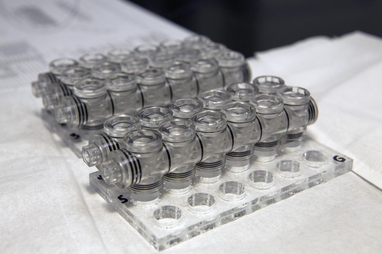 CAPE CANAVERAL, Fla. – Inside a laboratory in the Space Station Processing Facility at NASA's Kennedy Space Center in Florida, vials for the Protein Crystal Growth 2 experiment are being prepared for an acceptance leak test. The vials will be filled with clear water and then put in a vacuum chamber to verify that they are providing adequate containment for liquids. The experiment is one of many that will be delivered to the International Space Station on the SpaceX-4 commercial cargo resupply mission. Kennedy's ISS Ground Processing and Research Project Office is providing the necessary laboratories, equipment, supplies and consumables for 61 principal investigators, including 17 from other countries, as they prepare their science experiments for flight. The SpaceX-4 flight is targeted to launch in September 2014. Photo credit: NASA/Dimitri Gerondidakis