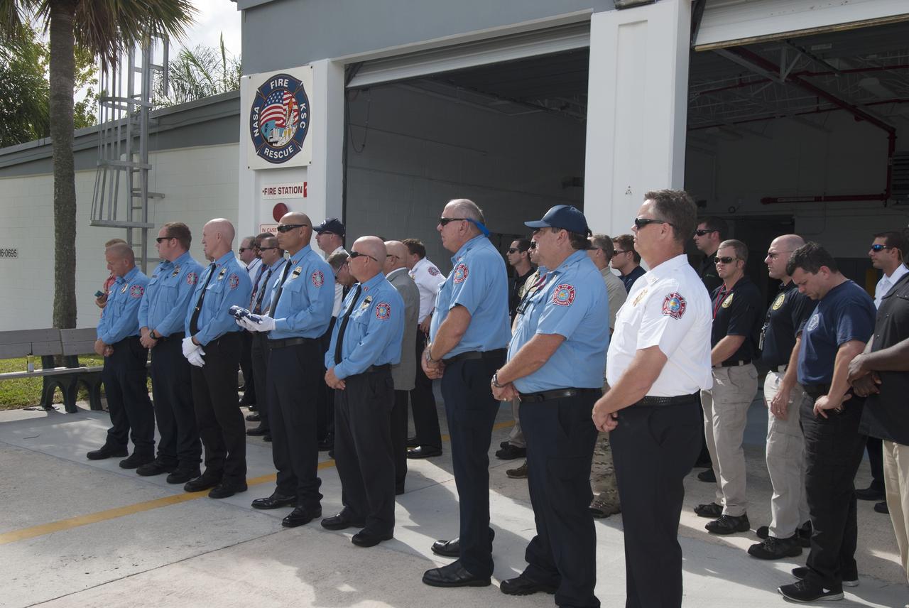 Cape Canaveral, Fla. – At Fire Station 1 at NASA’s Kennedy Space Center in Florida, Fire and Rescue personnel pause for a moment of silence during a ceremony commemorating the 13th anniversary of 9/11 at 10:28 a.m., which was the moment of collapse of the north tower of the World Trade Center. Photo credit: Jim Grossmann