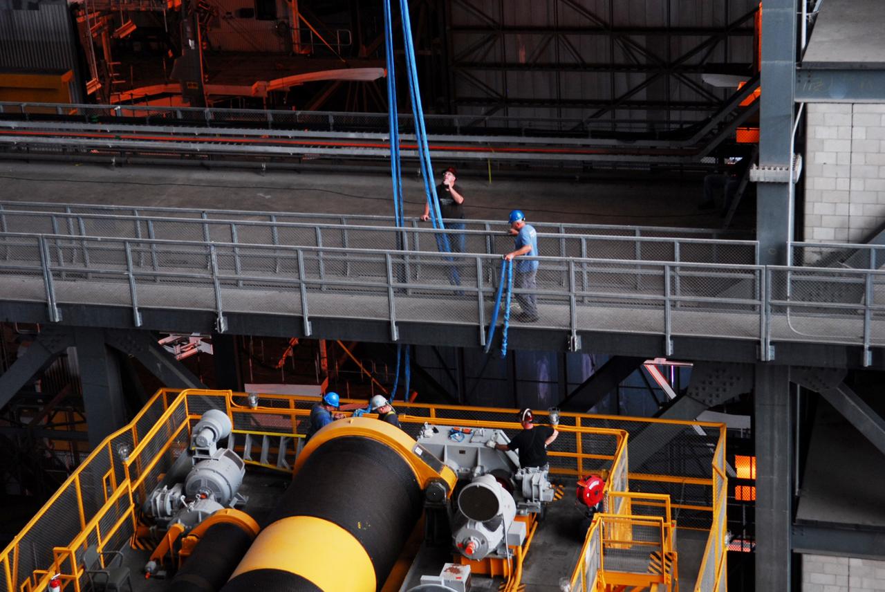 CAPE CANAVERAL, Fla. – Inside the Vehicle Assembly Building, or VAB, at NASA's Kennedy Space Center in Florida, preparations are underway to remove a portion of the catwalk on the east side of Level 16 to allow room for the removal of the 175-ton crane that is situated above the transfer aisle. The crane will be lowered to the floor to perform upgrades to its 45-year-old controls in order to improve reliability, precision and safety. The Ground Systems Development and Operations Program is overseeing upgrades and modifications to the VAB. The crane will be upgraded so that it can support lifting needs for NASA and other exploration vehicles, including the agency's Space Launch System and Orion spacecraft. Photo credit: NASA/Jim Grossmann