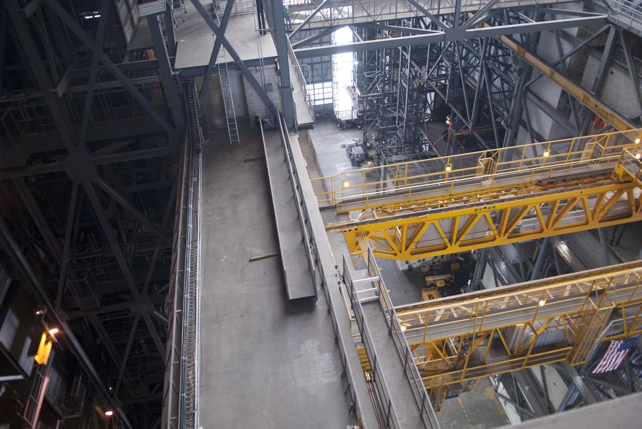 CAPE CANAVERAL, Fla. – Inside the Vehicle Assembly Building, or VAB, at NASA's Kennedy Space Center in Florida, a portion of the catwalk on the east side of Level 16 has been removed to allow room for the removal of the 175-ton crane that is situated above the transfer aisle. The crane will be lowered to the floor to perform upgrades to its 45-year-old controls in order to improve reliability, precision and safety. The Ground Systems Development and Operations Program is overseeing upgrades and modifications to the VAB. The crane will be upgraded so that it can support lifting needs for NASA and other exploration vehicles, including the agency's Space Launch System and Orion spacecraft. Photo credit: NASA/Jim Grossmann