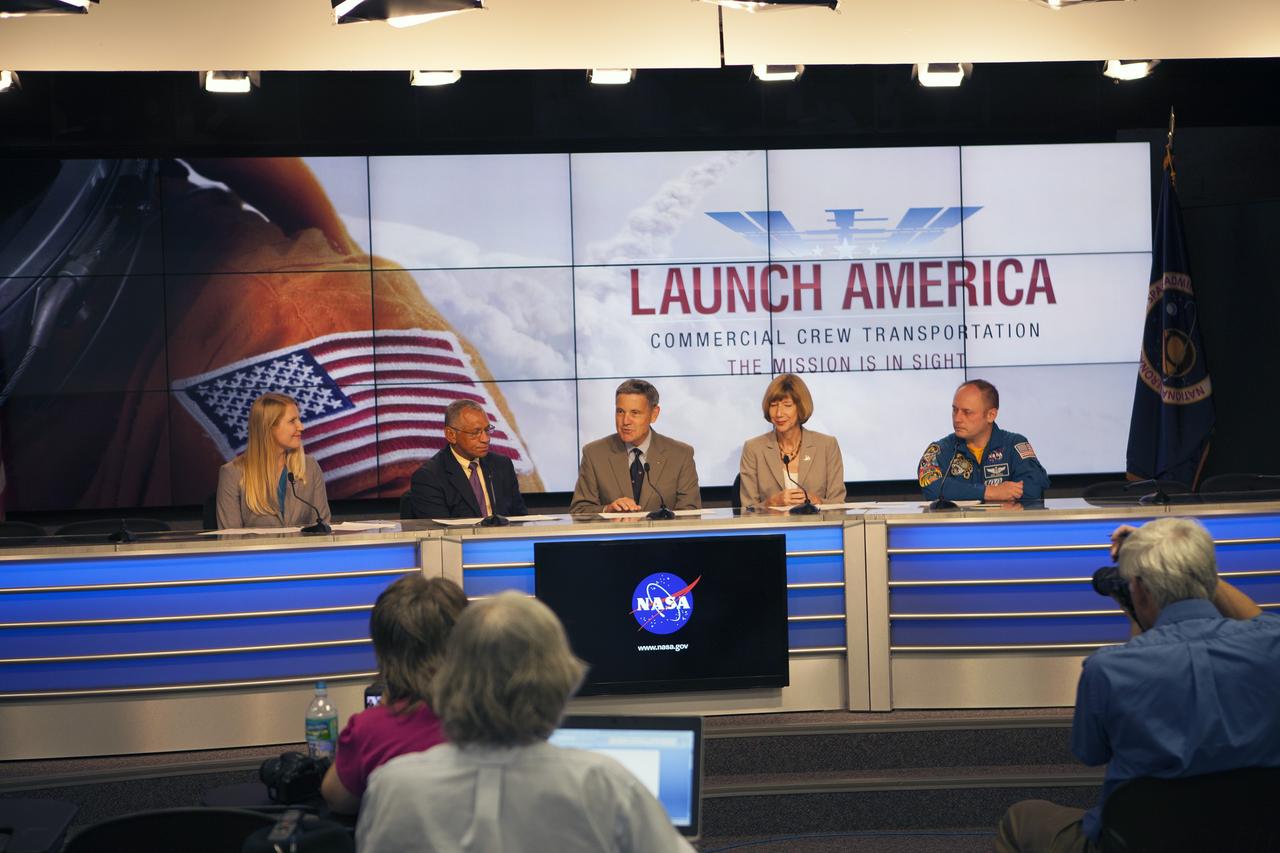 KSC-2014-3922 - CAPE CANAVERAL, Fla. – Former astronaut Bob Cabana, center, director of NASA's Kennedy Space Center in Florida, speaks at the start of the announcement ceremony to name the providers of the next generation of crewed American spacecraft. Speaking from Kennedy’s Press Site, Cabana detailed the importance of the development effort by the agency's Commercial Crew Program for United States space exploration ambitions and the economic potential of creating new markets in human space transportation. Boeing and SpaceX were awarded contracts to complete the design of the CST-100 and Crew Dragon spacecraft, respectively, and begin manufacturing for flight tests with a goal of achieving certification to take astronauts to the International Space Station by 2017. The Commercial Crew Transportation Capability CCtCap contract also covers the beginning of operational missions for these new spacecraft and their systems. NASA spokeswoman Stephanie Schierholz, from left, Charles Bolden, NASA administrator, Kathy Lueders, manager of the agency's Commercial Crew Program, and former International Space Station Commander Mike Fincke also took part in the announcement. Photo credit: NASA/Jim Grossmann