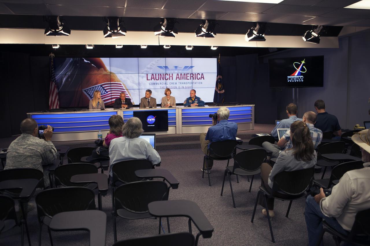 CAPE CANAVERAL, Fla. – Charles Bolden, second from left, NASA administrator, announces the Commercial Crew Transportation Capability CCtCap contract awards designed to complete the NASA certification for human space transportation systems capable of carrying people into orbit. Once certification is complete, NASA plans to use these systems to ferry astronauts to the International Space Station and return them safely to Earth.  Speaking from Kennedy Space Center’s Press Site, Bolden detailed the importance of the effort by the agency's Commercial Crew Program for United States space exploration ambitions and the economic potential of creating new markets in space transportation for people. Boeing and SpaceX were awarded contracts to complete the design of the CST-100 and Crew Dragon spacecraft, respectively, and begin manufacturing for flight tests with a goal of achieving certification to take astronauts to the International Space Station by 2017. CCtCap also covers the beginning of operational missions for these new spacecraft and their systems. NASA spokeswoman Stephanie Schierholz, from left, former astronaut Bob Cabana, director of Kennedy Space Center, Kathy Lueders, manager of the agency's Commercial Crew Program, and former International Space Station Commander Mike Fincke also took part in the announcement. Photo credit: NASA/Jim Grossmann