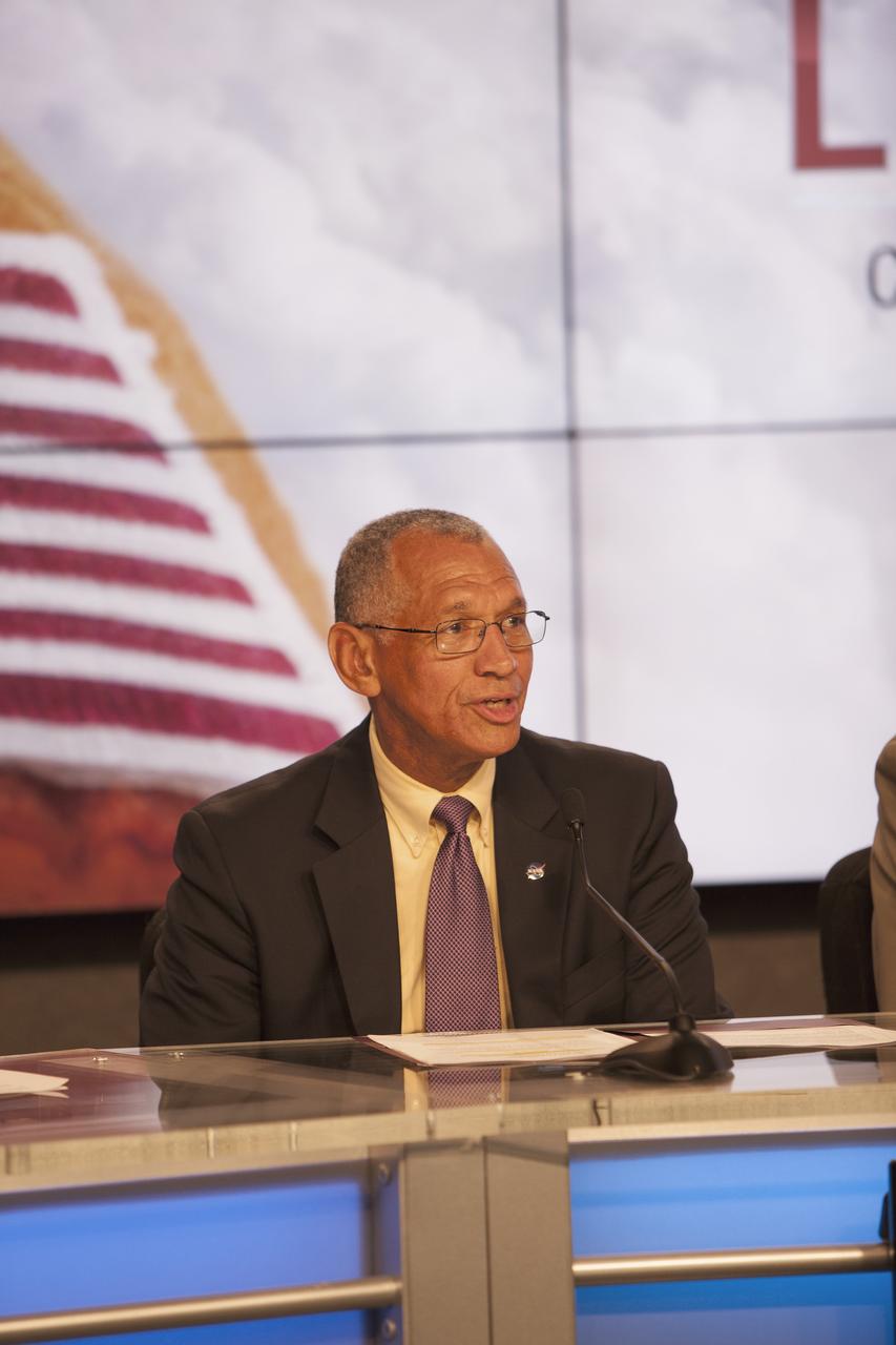 CAPE CANAVERAL, Fla. – Charles Bolden, NASA administrator, announces the Commercial Crew Transportation Capability CCtCap contract awards designed to complete the NASA certification for human space transportation systems capable of carrying people into orbit. Once certification is complete, NASA plans to use these systems to ferry astronauts to the International Space Station and return them safely to Earth.  Speaking from Kennedy Space Center’s Press Site, Bolden detailed the importance of the effort by the agency's Commercial Crew Program for United States space exploration ambitions and the economic potential of creating new markets in space transportation for people. Boeing and SpaceX were awarded contracts to complete the design of the CST-100 and Crew Dragon spacecraft, respectively, and begin manufacturing for flight tests with a goal of achieving certification to take astronauts to the International Space Station by 2017. CCtCap also covers the beginning of operational missions for these new spacecraft and their systems. NASA spokeswoman Stephanie Schierholz, former astronaut Bob Cabana, director of Kennedy Space Center, Kathy Lueders, manager of the agency's Commercial Crew Program, and former International Space Station Commander Mike Fincke also took part in the announcement. Photo credit: NASA/Jim Grossmann