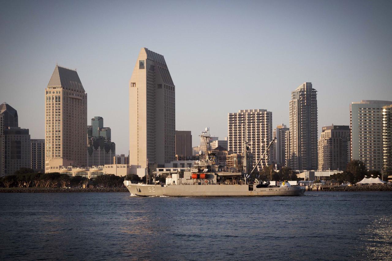 SAN DIEGO, Calif. – The USS Salvor, a safeguard-class rescue and salvage ship, departs from Naval Base San Diego on the first day of Orion Underway Recovery Test 4A. The Orion boilerplate test vehicle is in view on the ship. NASA, Lockheed Martin and the U.S. Navy will conduct alternate recovery methods using a stationary crane in the Pacific Ocean off the coast of San Diego to prepare for recovery of the Orion crew module on its return from a deep space mission. The underway recovery test allows the teams to demonstrate and evaluate recovery processes, procedures, new hardware and personnel in open waters.     The Ground Systems Development and Operations Program is conducting the underway recovery tests. Orion is the exploration spacecraft designed to carry astronauts to destinations not yet explored by humans, including an asteroid and Mars. It will have emergency abort capability, sustain the crew during space travel and provide safe re-entry from deep space return velocities. The first unpiloted test flight of Orion is scheduled to launch in 2014 atop a United Launch Alliance Delta IV Heavy rocket and in 2018 on NASA’s Space Launch System rocket. For more information, visit http://www.nasa.gov/orion. Photo credit: NASA/Cory Huston