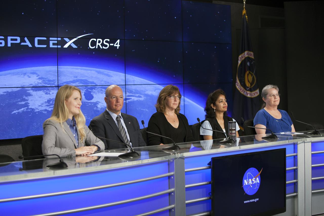 CAPE CANAVERAL, Fla. – Members of an ISS Science Panel on Model Organisms brief media representatives in Kennedy Space Center’s Press Site auditorium in preparation for the launch of the SpaceX CRS-4 mission to resupply the International Space Station. From left are Stephanie Schierholz, NASA Public Affairs, Marshall Porterfield, division director, Space Life and Physical Sciences, HEOMD, Shiela Neilsen, principal investigator, Micro-8, University of Montana, Sharmila Bhattacharya, principal investigator, Ames Student Fruit-Fly Experiment, NASA Ames Research Center, and Ruth Globus, project scientist, Rodent Habitat/Rodent Research-1, NASA Ames.    The mission is the fourth of 12 SpaceX flights NASA contracted with the company to resupply the space station. It will be the fifth trip by a Dragon spacecraft to the orbiting laboratory. The spacecraft’s 2.5 tons of supplies, science experiments, and technology demonstrations include critical materials to support 255 science and research investigations that will occur during the station's Expeditions 41 and 42. Liftoff is targeted for an instantaneous window at 2:14 a.m. EDT. To learn more about the mission, visit http://www.nasa.gov/mission_pages/station/structure/launch/index.html. Photo credit: NASA/Jim Grossmann