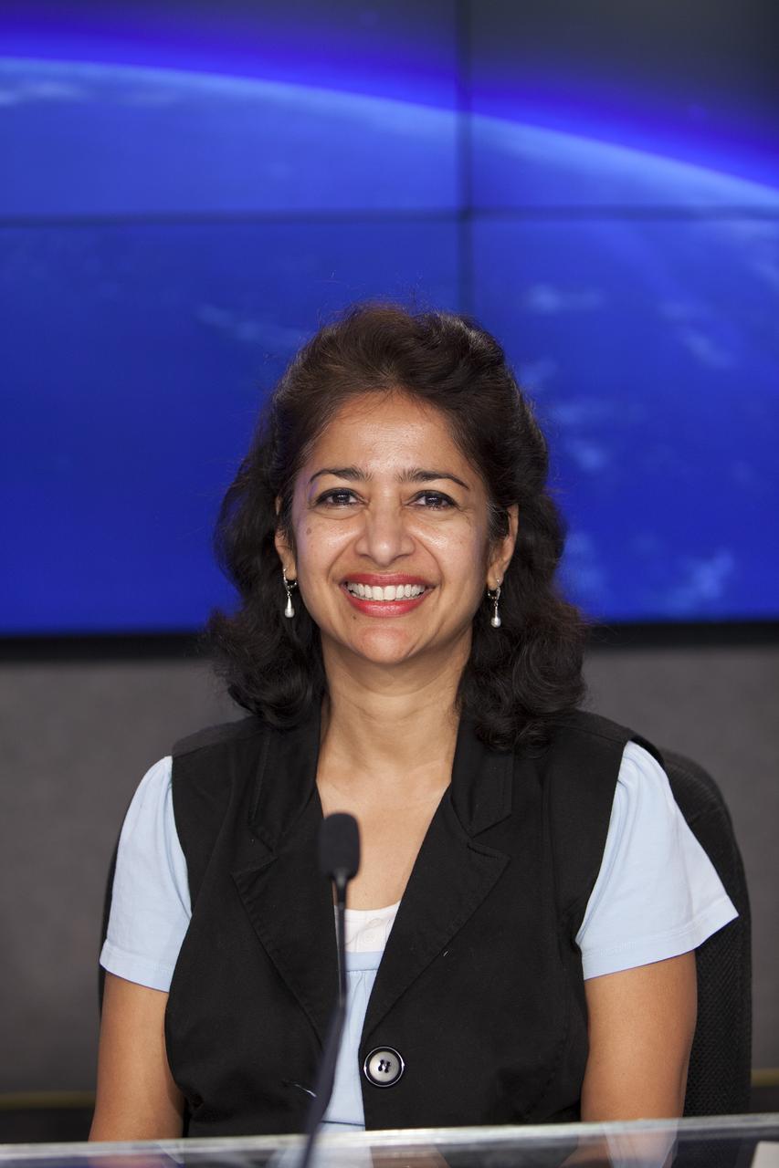 CAPE CANAVERAL, Fla. – Sharmila Bhattacharya, principal investigator, Ames Student Fruit-Fly Experiment, NASA Ames Research Center, briefs media representatives in Kennedy Space Center’s Press Site auditorium in preparation for the launch of the SpaceX CRS-4 mission to resupply the International Space Station. Bhattacharya is a member of the ISS Science Panel on Model Organisms.    The mission is the fourth of 12 SpaceX flights NASA contracted with the company to resupply the space station. It will be the fifth trip by a Dragon spacecraft to the orbiting laboratory. The spacecraft’s 2.5 tons of supplies, science experiments, and technology demonstrations include critical materials to support 255 science and research investigations that will occur during the station's Expeditions 41 and 42. Liftoff is targeted for an instantaneous window at 2:14 a.m. EDT. To learn more about the mission, visit http://www.nasa.gov/mission_pages/station/structure/launch/index.html. Photo credit: NASA/Jim Grossmann