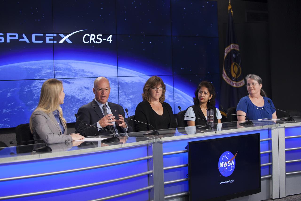 CAPE CANAVERAL, Fla. – Members of an ISS Science Panel on Model Organisms brief media representatives in Kennedy Space Center’s Press Site auditorium in preparation for the launch of the SpaceX CRS-4 mission to resupply the International Space Station. From left are Stephanie Schierholz, NASA Public Affairs, Marshall Porterfield, division director, Space Life and Physical Sciences, HEOMD, Shiela Neilsen, principal investigator, Micro-8, University of Montana, Sharmila Bhattacharya, principal investigator, Ames Student Fruit-Fly Experiment, NASA Ames Research Center, and Ruth Globus, project scientist, Rodent Habitat/Rodent Research-1, NASA Ames.    The mission is the fourth of 12 SpaceX flights NASA contracted with the company to resupply the space station. It will be the fifth trip by a Dragon spacecraft to the orbiting laboratory. The spacecraft’s 2.5 tons of supplies, science experiments, and technology demonstrations include critical materials to support 255 science and research investigations that will occur during the station's Expeditions 41 and 42. Liftoff is targeted for an instantaneous window at 2:14 a.m. EDT. To learn more about the mission, visit http://www.nasa.gov/mission_pages/station/structure/launch/index.html. Photo credit: NASA/Jim Grossmann