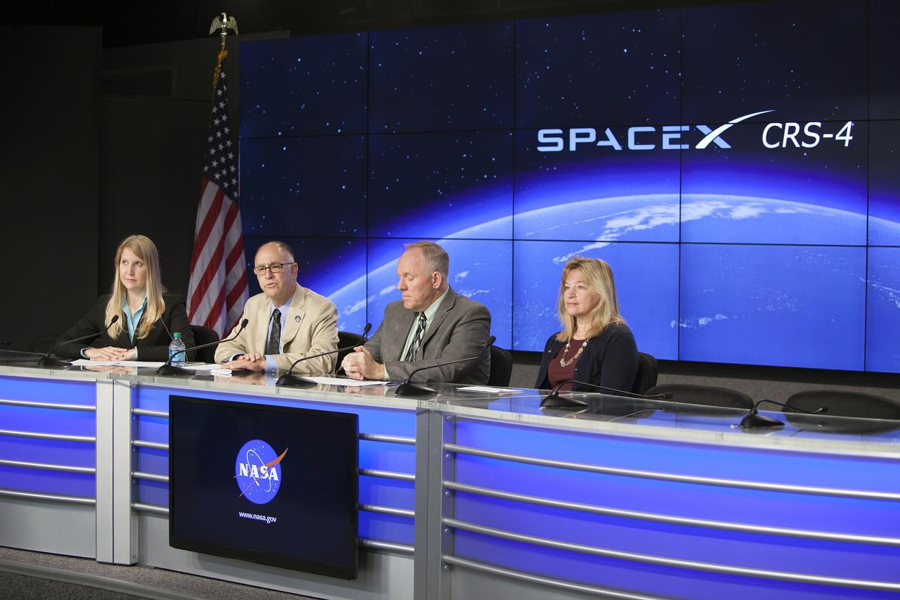 CAPE CANAVERAL, Fla. – Members of NASA’s International Space Station science team brief news media representatives in the Kennedy Space Center’s Press Site auditorium in preparation for the launch of the SpaceX CRS-4 mission to resupply the International Space Station. From left are Stephanie Schierholz, NASA Headquarters Office of Communications, Sam Scimemi, International Space Station Division director of Human Exploration and Operation Mission Directorate, Jeff Sheehy, senior technologist for the Space Technology Mission Directorate, and Ellen Stofan, NASA’s Chief Scientist. The mission is the fourth of 12 SpaceX flights NASA contracted with the company to resupply the space station. It will be the fifth trip by a Dragon spacecraft to the orbiting laboratory. The spacecraft’s 2.5 tons of supplies, science experiments, and technology demonstrations include critical materials to support 255 science and research investigations that will occur during the station's Expeditions 41 and 42. Liftoff is targeted for an instantaneous window at 2:14 a.m. EDT. To learn more about the mission, visit http://www.nasa.gov/mission_pages/station/structure/launch/index.html Photo credit: NASA/Jim Grossmann