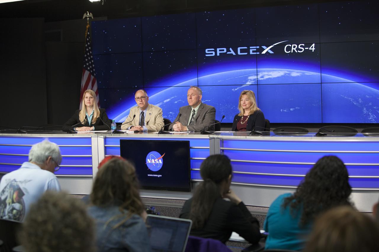 CAPE CANAVERAL, Fla. – Members of NASA’s International Space Station science team brief news media representatives in the Kennedy Space Center’s Press Site auditorium in preparation for the launch of the SpaceX CRS-4 mission to resupply the International Space Station. From left are Stephanie Schierholz, NASA Headquarters Office of Communications, Sam Scimemi, International Space Station Division director of Human Exploration and Operation Mission Directorate, Jeff Sheehy, senior technologist for the Space Technology Mission Directorate, and Ellen Stofan, NASA’s Chief Scientist. The mission is the fourth of 12 SpaceX flights NASA contracted with the company to resupply the space station. It will be the fifth trip by a Dragon spacecraft to the orbiting laboratory. The spacecraft’s 2.5 tons of supplies, science experiments, and technology demonstrations include critical materials to support 255 science and research investigations that will occur during the station's Expeditions 41 and 42. Liftoff is targeted for an instantaneous window at 2:14 a.m. EDT. To learn more about the mission, visit http://www.nasa.gov/mission_pages/station/structure/launch/index.html Photo credit: NASA/Jim Grossmann