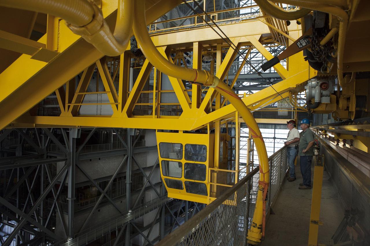 CAPE CANAVERAL, Fla. – Inside the Vehicle Assembly Building, or VAB, at NASA's Kennedy Space Center in Florida, preparations are underway to lower the 175-ton crane. In view is the cab that is used to control the crane. The crane is being lowered from Level 16 down to the floor of the transfer aisle to perform upgrades to its 45-year-old controls in order to improve reliability, precision and safety. The Ground Systems Development and Operations Program is overseeing upgrades and modifications to the VAB. The crane will be upgraded so that it can support lifting needs for NASA and other exploration vehicles, including the agency's Space Launch System and Orion spacecraft. Photo credit: NASA/Daniel Casper