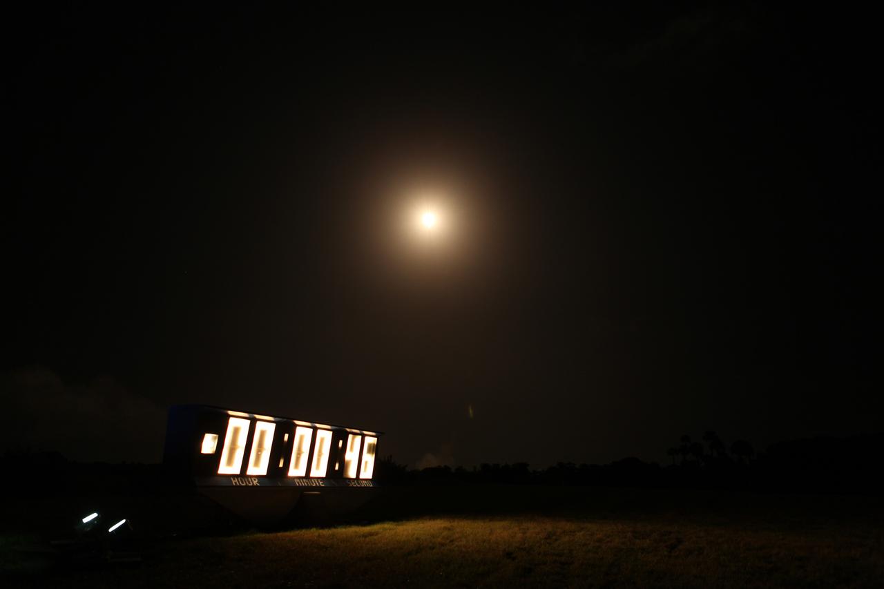 CAPE CANAVERAL, Fla. – The countdown clock at the NASA Press Site ticks off the seconds following liftoff of the Falcon 9 rocket from Space Launch Complex 40 on Cape Canaveral Air Force Station in Florida, carrying the SpaceX CRS-4 mission to orbit. Liftoff was at 1:52 a.m. EDT. The mission is the fourth of 12 SpaceX flights NASA contracted with the company to resupply the space station. It will be the fifth trip by a Dragon spacecraft to the orbiting laboratory. The spacecraft’s 2.5 tons of supplies, science experiments, and technology demonstrations include critical materials to support 255 science and research investigations that will occur during the station's Expeditions 41 and 42. To learn more about the mission, visit http://www.nasa.gov/mission_pages/station/structure/launch/index.html. Photo credit: NASA/Frankie Martin