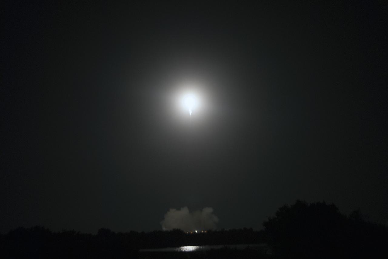 CAPE CANAVERAL, Fla. – The Falcon 9 rocket soars into the night sky leaving an exhaust cloud hovering over Space Launch Complex 40 on Cape Canaveral Air Force Station in Florida. The SpaceX CRS-4 mission is underway. Liftoff was at 1:52 a.m. EDT. The mission is the fourth of 12 SpaceX flights NASA contracted with the company to resupply the space station. It will be the fifth trip by a Dragon spacecraft to the orbiting laboratory. The spacecraft’s 2.5 tons of supplies, science experiments, and technology demonstrations include critical materials to support 255 science and research investigations that will occur during the station's Expeditions 41 and 42. To learn more about the mission, visit http://www.nasa.gov/mission_pages/station/structure/launch/index.html. Photo credit: NASA/Jim Grossmann