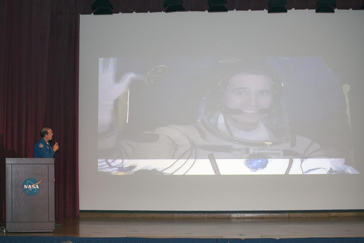 CAPE CANAVERAL, Fla. – NASA astronaut Rick Mastracchio discusses the highlights of the Expedition 38 mission to the International Space Station with the audience at a post-flight presentation.    The Space Flight Awareness Program hosted Mastracchio's presentation for employees in the KSC Training Auditorium at NASA's Kennedy Space Center in Florida. An Expedition 38/39 crew member, Mastracchio launched to the station from the Baikonur Cosmodrome in Kazakhstan on Nov. 6, 2013, and returned to Earth on May 13, 2014, after 188 days in space. Following Mastracchio's remarks, employees were given the opportunity to ask questions and to meet him in person. To read Mastracchio's biography, visit http://www.jsc.nasa.gov/Bios/htmlbios/mastracc.html. For more information on Expedition 38, visit http://www.nasa.gov/mission_pages/station/expeditions/expedition38. Photo credit: NASA/Daniel Casper