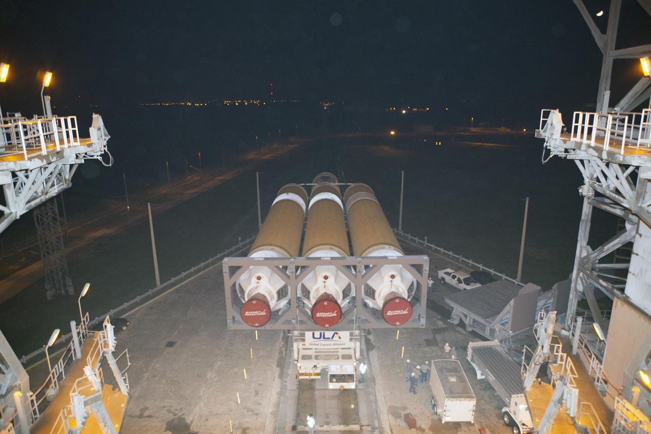 CAPE CANAVERAL, Fla. – The United Launch Alliance Delta IV Heavy rocket for Exploration Flight Test-1 arrives at the pad at Space Launch Complex 37 at Cape Canaveral Air Force Station in Florida. The rocket is secured on the Elevated Platform Transporter. The Delta IV Heavy will launch Orion on its first flight test. During its first flight test, Orion will travel farther into space than any human spacecraft has gone in more than 40 years. The data gathered during the flight will influence design decisions, validate existing computer models and innovative new approaches to space systems development, as well as reduce overall mission risks and costs for later Orion flights. Liftoff of Orion on the first flight test is planned for December 2014. Photo credit: NASA/Dimitri Gerondidakis