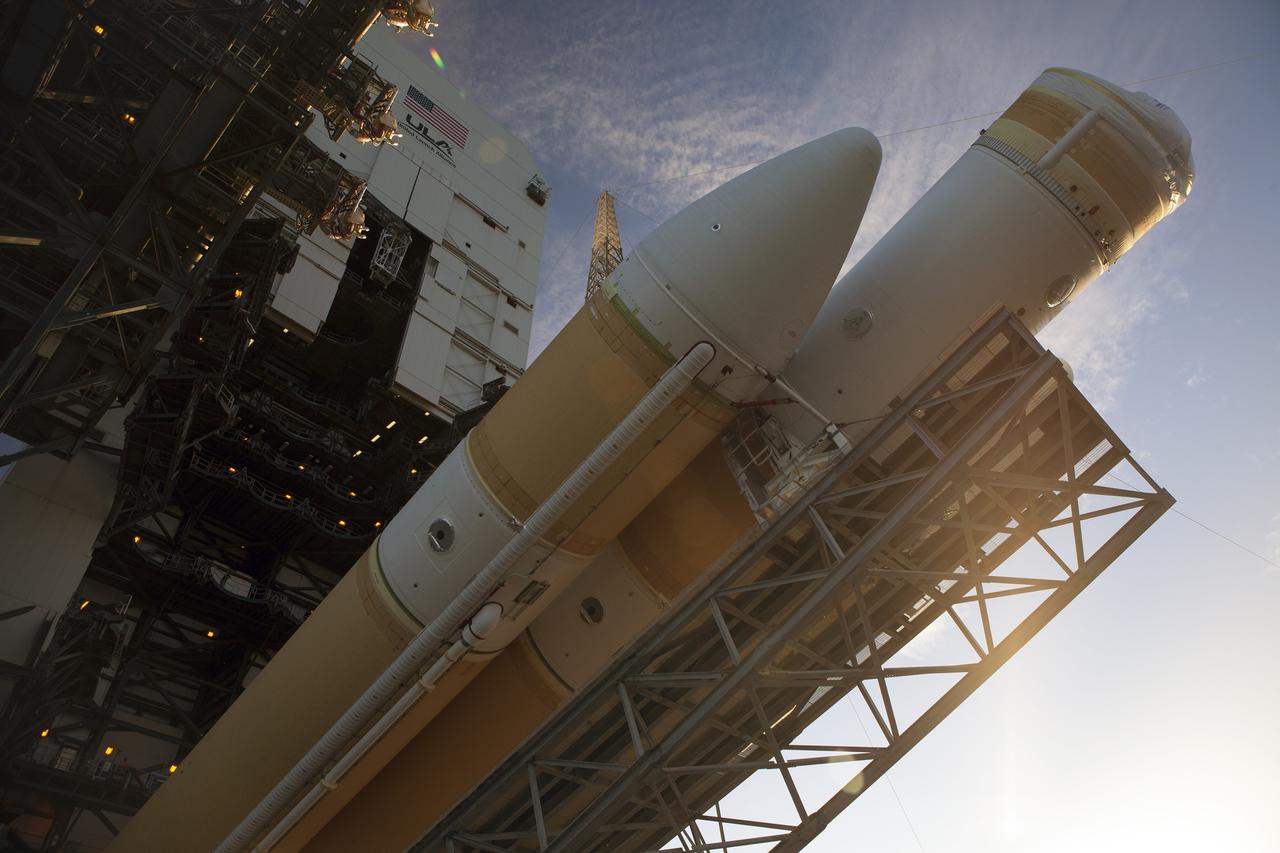 CAPE CANAVERAL, Fla. – This close-up view shows the United Launch Alliance Delta IV Heavy rocket for Exploration Flight Test-1 being raised into the vertical position at the pad at Space Launch Complex 37 at Cape Canaveral Air Force Station in Florida. The Delta IV Heavy is being readied to launch Orion on its first flight test. During its first flight test, Orion will travel farther into space than any human spacecraft has gone in more than 40 years. The data gathered during the flight will influence design decisions, validate existing computer models and innovative new approaches to space systems development, as well as reduce overall mission risks and costs for later Orion flights. Liftoff of Orion on the first flight test is planned for December 2014. Photo credit: NASA/Daniel Casper