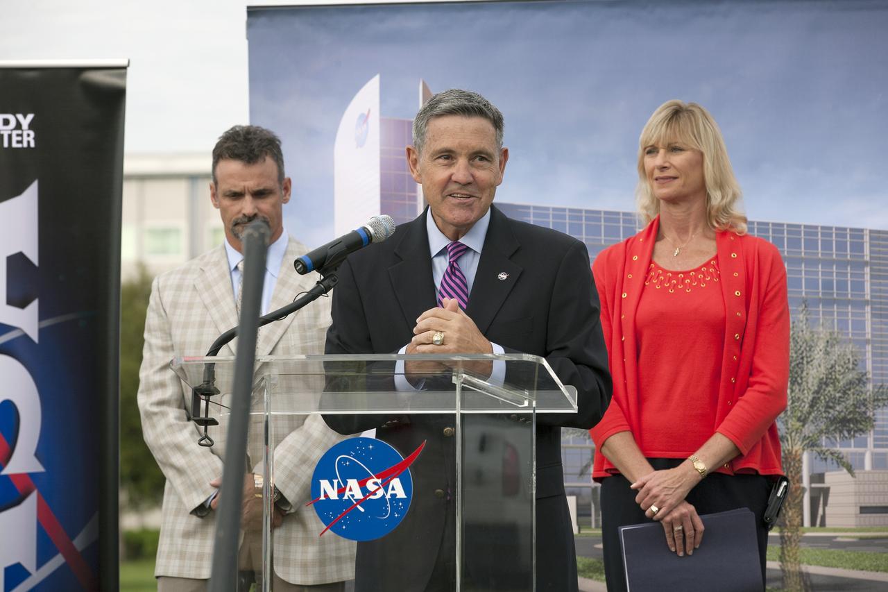 CAPE CANAVERAL, Fla. – Groundbreaking for the new Central Campus will take place in the Industrial Area at NASA's Kennedy Space Center in Florida. Kennedy Center Director Bob Cabana welcomes members of the media and guests to the ceremony. To his right is Nancy Bray, director of Kennedy's Center Operations Directorate. To his left is Kirk Hazen, southeast district manager and vice president of Hensel Phelps, the construction contractor.    Kennedy is transforming into a multi-user, 21st century spaceport supporting both commercial and government users and operations. Central Campus Phase I includes construction of a new Headquarters Building as one of the major components of the strategy. The new Headquarters Building will be a seven-story, 200,000-square-foot facility that will house about 500 NASA civil service and contractor employees. Photo credit: NASA/Kim Shiflett