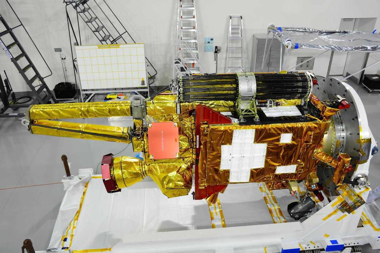 VANDENBERG AIR FORCE BASE, Calif. – Inside the Astrotech payload processing facility on Vandenberg Air Force Base in California, processing has begun on NASA's Soil Moisture Active Passive, or SMAP, spacecraft.    SMAP will launch on a Delta II 7320 configuration vehicle featuring a United Launch Alliance first stage booster powered by an Aerojet Rocketdyne RS-27A main engine and three Alliant Techsystems, or ATK, strap-on solid rocket motors. Once on station in Earth orbit, SMAP will provide global measurements of soil moisture and its freeze/thaw state. These measurements will be used to enhance understanding of processes that link the water, energy and carbon cycles, and to extend the capabilities of weather and climate prediction models. SMAP data also will be used to quantify net carbon flux in boreal landscapes and to develop improved flood prediction and drought monitoring capabilities. Launch from Space Launch Complex 2 is targeted for Jan. 29, 2015. To learn more about SMAP, visit http://smap.jpl.nasa.gov Photo credit: NASA/ Randy Beaudoin