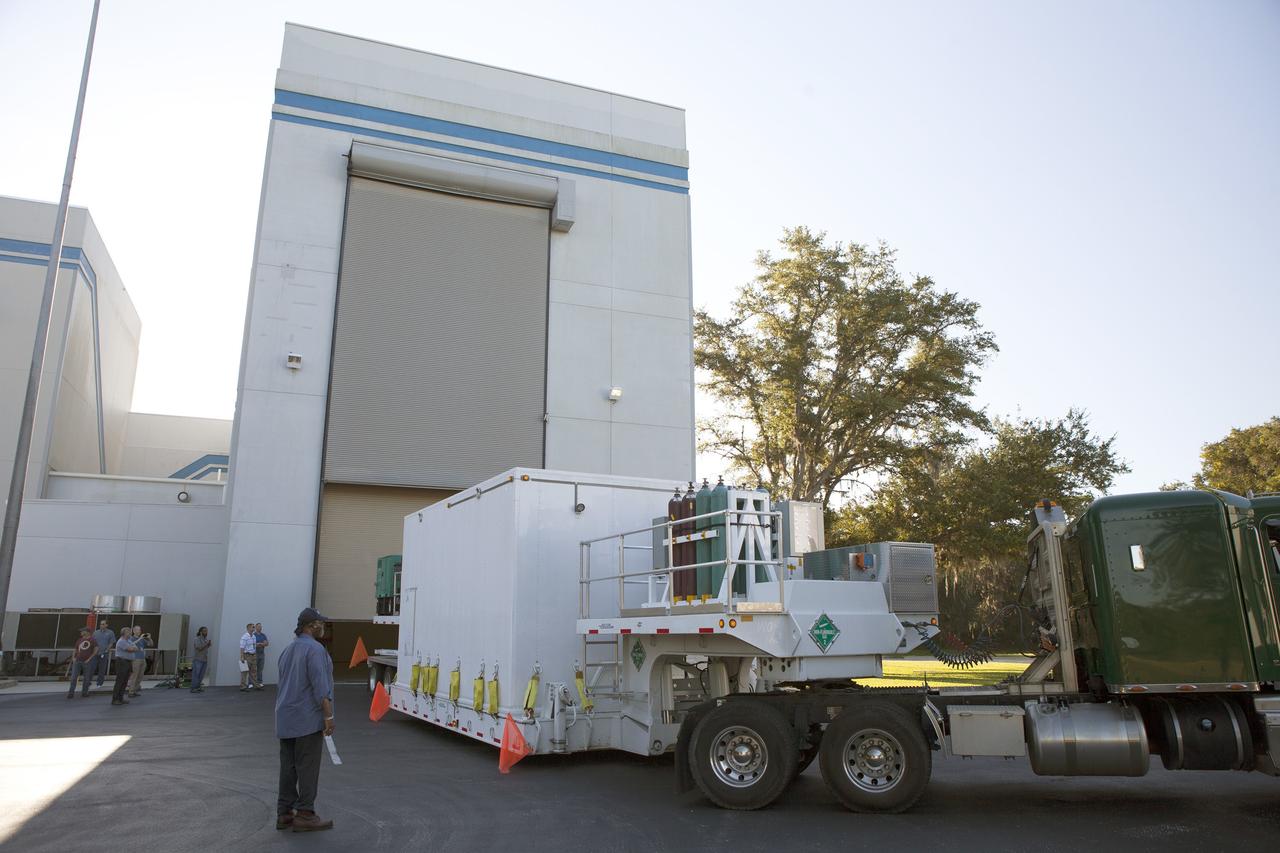 CAPE CANAVERAL, Fla. – Operations are underway to move the protective shipping container enclosing the Magnetospheric Multiscale spacecraft into the airlock of Building 2 at the Astrotech payload processing facility in Titusville, Florida, near Kennedy Space Center. MMS is a Solar Terrestrial Probes mission comprising four identically instrumented spacecraft that will use Earth’s magnetosphere as a laboratory to study the microphysics of three fundamental plasma processes: magnetic reconnection, energetic particle acceleration and turbulence. Launch aboard a United Launch Alliance Atlas V rocket from Space Launch Complex 41 on Cape Canaveral Air Force Station is targeted for March 12, 2015. To learn more about MMS, visit http://mms.gsfc.nasa.gov. Photo credit: NASA/Kim Shiflett