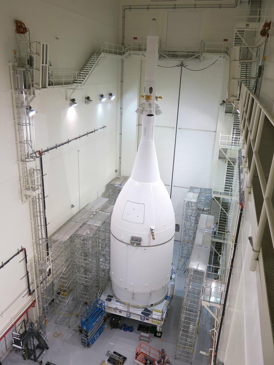 NASA’s Orion spacecraft was completed Thursday, Oct. 30, 2014 in the Launch Abort System Facility at NASA’s Kennedy Space Center in Florida. It will reside there until Nov. 10, when it will be rolled out to Launch Complex 37 at Cape Canaveral Air Force Station ahead of its Dec. 4 test flight. Photo credit: Lockheed Martin