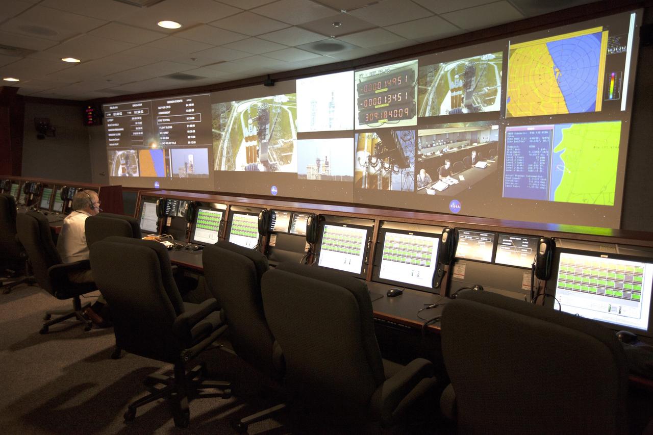 CAPE CANAVERAL, Fla. – In the Hangar A&E control room, displays are seen during a dress rehearsal for the launch of the United Launch Alliance Delta IV Heavy rocket for the upcoming Orion Flight Test.      Orion is the exploration spacecraft designed to carry astronauts to destinations not yet explored by humans, including an asteroid and Mars. It will have emergency abort capability, sustain the crew during space travel and provide safe re-entry from deep space return velocities. The first unpiloted flight test of Orion is scheduled to launch Dec. 4, 2014 atop a United Launch Alliance Delta IV Heavy rocket, and in 2018 on NASA’s Space Launch System rocket. For more information, visit www.nasa.gov/orion Photo credit: NASA/Kim Shiflett