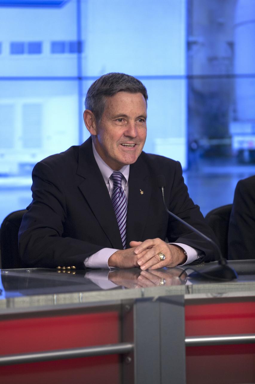 CAPE CANAVERAL, Fla. – In the Kennedy Space Center’s Press Site auditorium, center director Bob Cabana spoke to members of the news media as the completed Orion spacecraft was being prepared for its trip from the Launch Abort System Facility to Launch Complex 37 at Cape Canaveral Air Force Station.      Orion is the exploration spacecraft designed to carry astronauts to destinations not yet explored by humans, including an asteroid and Mars. It will have emergency abort capability, sustain the crew during space travel and provide safe re-entry from deep space return velocities. The first unpiloted flight test of Orion is scheduled to launch Dec. 4, 2014 atop a United Launch Alliance Delta IV Heavy rocket, and in 2018 on NASA’s Space Launch System rocket. For more information, visit www.nasa.gov/orion Photo credit: NASA/Kim Shiflett