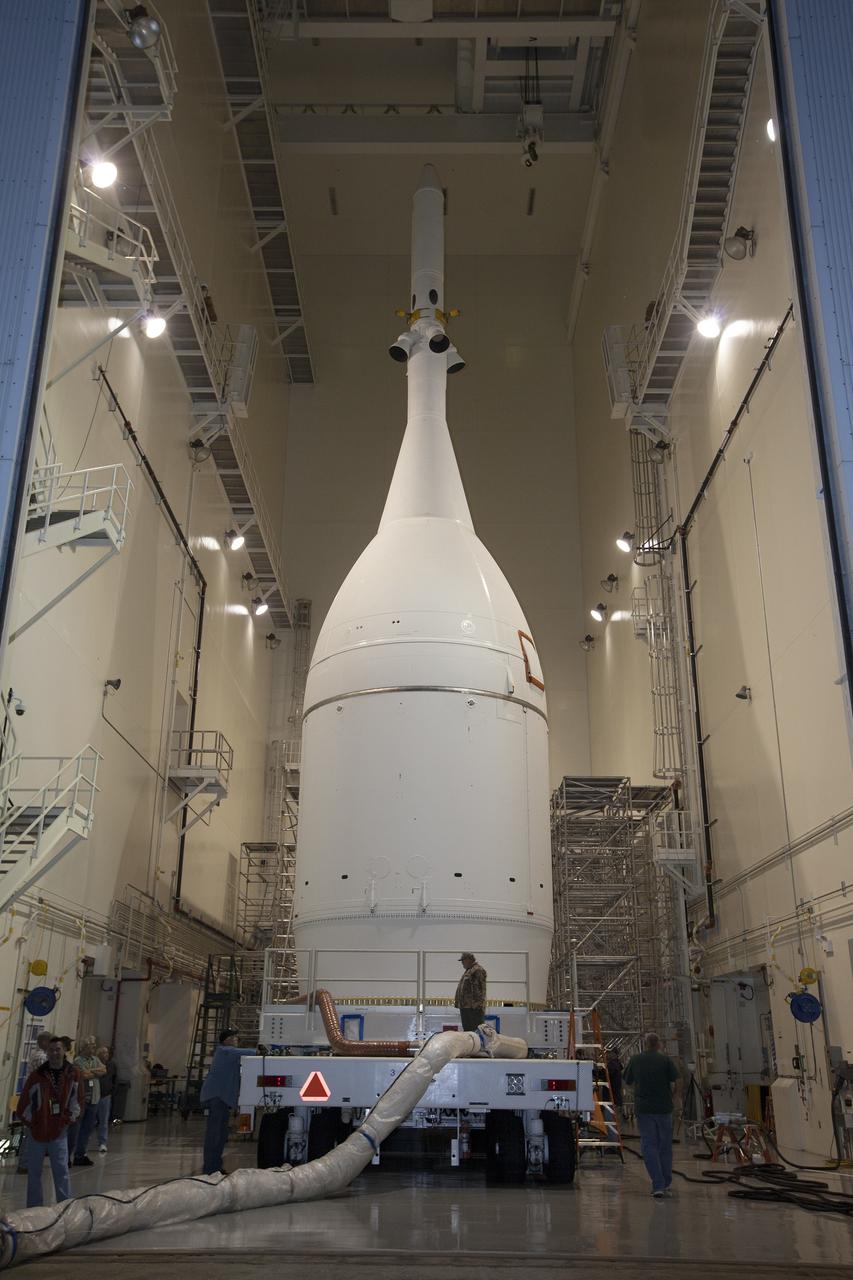 CAPE CANAVERAL, Fla. – At NASA's Kennedy Space Center in Florida, the agency's completed Orion spacecraft begins its trip from the Launch Abort System Facility to Launch Complex 37 at Cape Canaveral Air Force Station. After arrival at the launch pad, United Launch Alliance engineers and technicians will lift Orion and mount it atop its Delta IV Heavy rocket. Orion is the exploration spacecraft designed to carry astronauts to destinations not yet explored by humans, including an asteroid and Mars. It will have emergency abort capability, sustain the crew during space travel and provide safe re-entry from deep space return velocities. The first unpiloted flight test of Orion is scheduled to launch Dec. 4, 2014 atop a United Launch Alliance Delta IV Heavy rocket, and in 2018 on NASA’s Space Launch System rocket. For more information, visit www.nasa.gov/orion Photo credit: NASA/Kim Shiflett