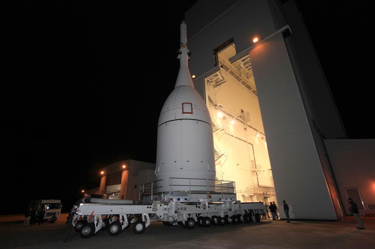 CAPE CANAVERAL, Fla. – At NASA's Kennedy Space Center in Florida, the agency's completed Orion spacecraft begins its trip from the Launch Abort System Facility to Launch Complex 37 at Cape Canaveral Air Force Station. After arrival at the launch pad, United Launch Alliance engineers and technicians will lift Orion and mount it atop its Delta IV Heavy rocket.    Orion is the exploration spacecraft designed to carry astronauts to destinations not yet explored by humans, including an asteroid and Mars. It will have emergency abort capability, sustain the crew during space travel and provide safe re-entry from deep space return velocities. The first unpiloted flight test of Orion is scheduled to launch Dec. 4, 2014 atop a United Launch Alliance Delta IV Heavy rocket, and in 2018 on NASA’s Space Launch System rocket. For more information, visit www.nasa.gov/orion Photo credit: NASA/Kim Shiflett
