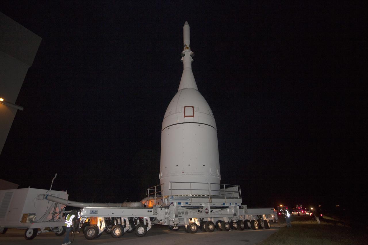 CAPE CANAVERAL, Fla. – At NASA's Kennedy Space Center in Florida, the agency's completed Orion spacecraft begins its trip from the Launch Abort System Facility to Launch Complex 37 at Cape Canaveral Air Force Station. After arrival at the launch pad, United Launch Alliance engineers and technicians will lift Orion and mount it atop its Delta IV Heavy rocket.      Orion is the exploration spacecraft designed to carry astronauts to destinations not yet explored by humans, including an asteroid and Mars. It will have emergency abort capability, sustain the crew during space travel and provide safe re-entry from deep space return velocities. The first unpiloted flight test of Orion is scheduled to launch Dec. 4, 2014 atop a United Launch Alliance Delta IV Heavy rocket, and in 2018 on NASA’s Space Launch System rocket. For more information, visit www.nasa.gov/orion Photo credit: NASA/Kim Shiflett