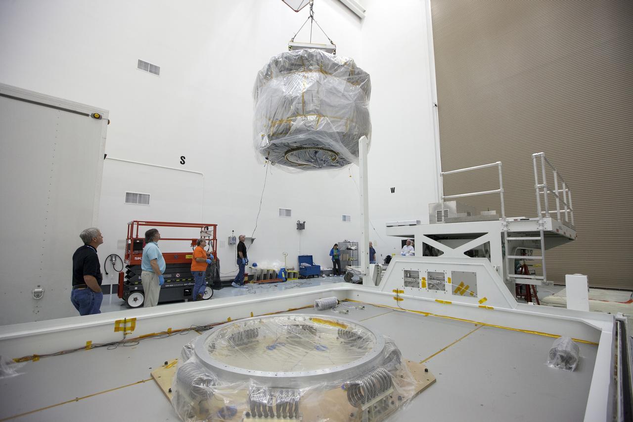 CAPE CANAVERAL, Fla. – Two Magnetospheric Multiscale, or MMS, spacecraft comprising the mission’s upper stack are lifted from the transporter in Building 2 of the Astrotech payload processing facility in Titusville, Florida, near Kennedy Space Center. The two MMS spacecraft comprising the lower stack arrived at Astrotech on Oct. 29. The Magnetospheric Multiscale mission is a Solar Terrestrial Probes mission comprising four identically instrumented spacecraft that will use Earth’s magnetosphere as a laboratory to study the microphysics of three fundamental plasma processes: magnetic reconnection, energetic particle acceleration and turbulence. Launch aboard a United Launch Alliance Atlas V rocket from Space Launch Complex 41 on Cape Canaveral Air Force Station is targeted for March 12, 2015. To learn more about MMS, visit http://mms.gsfc.nasa.gov.  Photo credit: NASA/Kim Shiflett