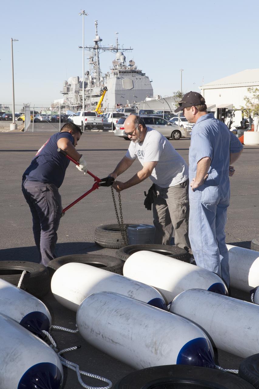 SAN DIEGO, Calif. – Ground support equipment for use during an alternate recovery method of the Orion crew module after its first flight test, is being prepared for loading into the well deck of the USNS Salvor, a salvage ship, at Naval Base San Diego in California. Before launch of Orion on a Delta IV Heavy rocket from Cape Canaveral Air Force Station in Florida, NASA, Lockheed Martin and U.S. Navy personnel will head out to sea in the USS Anchorage and the USNS Salvor and wait for splashdown of the Orion crew module in the Pacific Ocean. The Ground Systems Development and Operations Program will lead the recovery efforts. Orion is the exploration spacecraft designed to carry astronauts to destinations not yet explored by humans, including an asteroid and Mars. It will have emergency abort capability, sustain the crew during space travel and provide safe re-entry from deep space return velocities. The first unpiloted flight test of Orion is scheduled to launch in December atop a United Launch Alliance Delta IV Heavy rocket and in 2018 on NASA’s Space Launch System rocket. For more information, visit http://www.nasa.gov/orion. Photo credit: NASA/Dimitri Gerondidakis