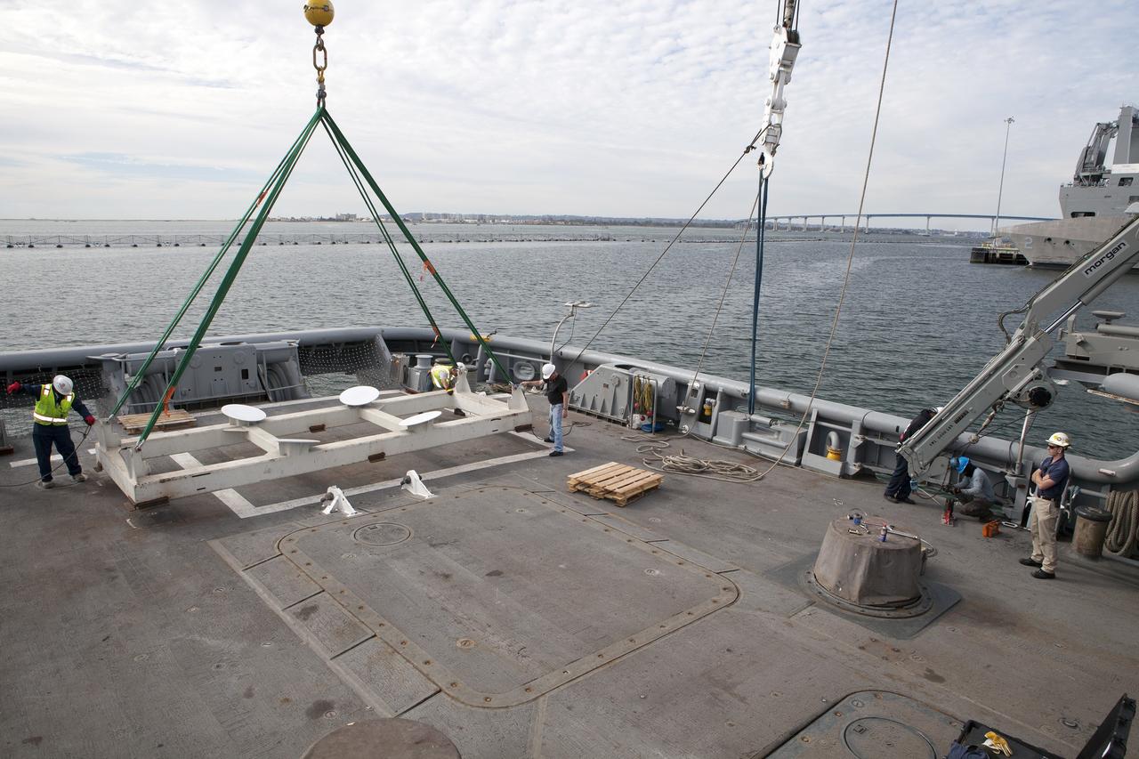 SAN DIEGO, Calif. – Ground support equipment for use during an alternate recovery method of the Orion crew module after its first flight test, if needed, is secured on the deck of the USNS Salvor, a salvage ship, at Naval Base San Diego in California. Before launch of Orion on a Delta IV Heavy rocket from Cape Canaveral Air Force Station in Florida, NASA, Lockheed Martin and U.S. Navy personnel will head out to sea in the USS Anchorage and the USNS Salvor and wait for splashdown of the Orion crew module in the Pacific Ocean. The GSDO Program will lead the recovery efforts. Orion is the exploration spacecraft designed to carry astronauts to destinations not yet explored by humans, including an asteroid and Mars. It will have emergency abort capability, sustain the crew during space travel and provide safe re-entry from deep space return velocities. The first unpiloted flight test of Orion is scheduled to launch in December atop a United Launch Alliance Delta IV Heavy rocket and in 2018 on NASA’s Space Launch System rocket. For more information, visit http://www.nasa.gov/orion. Photo credit: NASA/Dimitri Gerondidakis