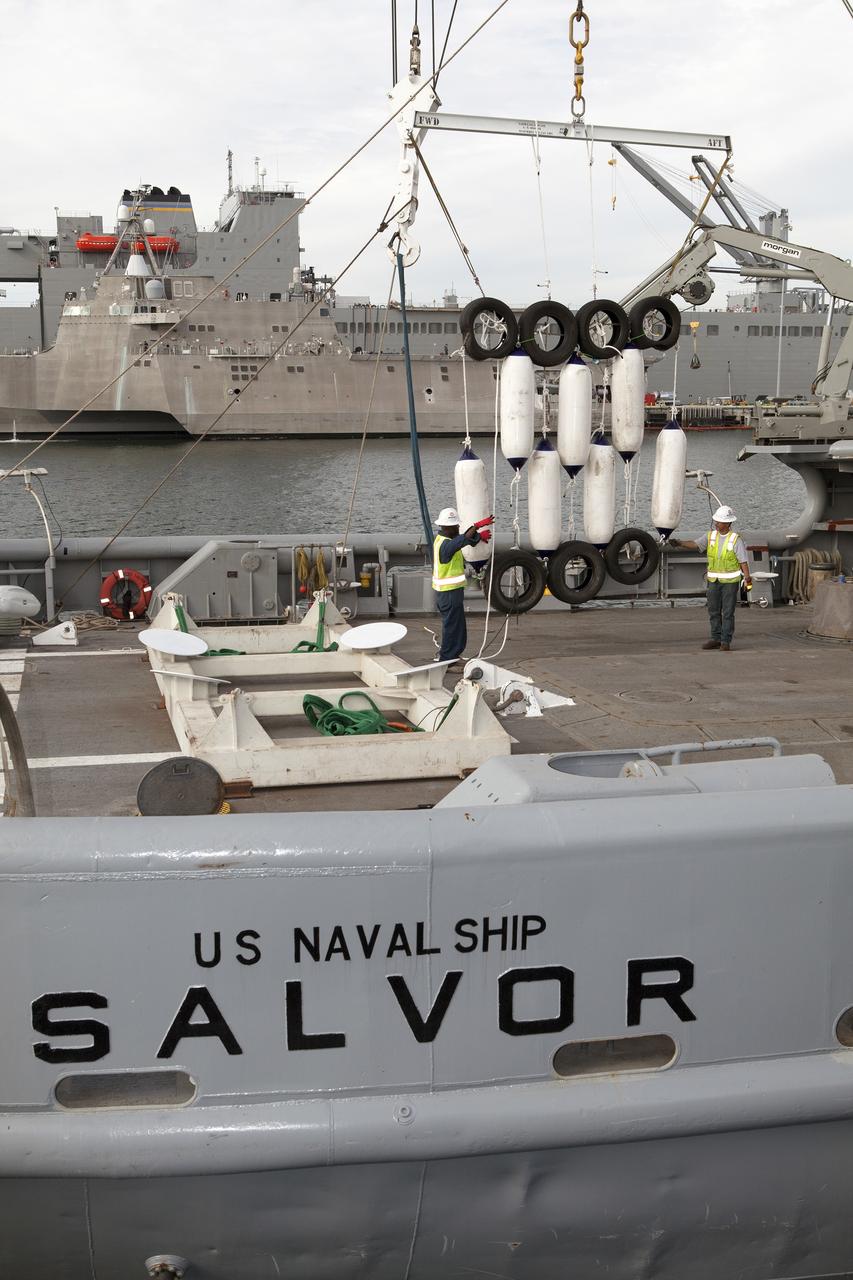 SAN DIEGO, Calif. – Ground support equipment for use during an alternate recovery method of the Orion crew module after its first flight test, if needed, is lowered by crane onto the deck of the USNS Salvor, a salvage ship, at Naval Base San Diego in California. Before launch of Orion on a Delta IV Heavy rocket from Cape Canaveral Air Force Station in Florida, NASA, Lockheed Martin and U.S. Navy personnel will head out to sea in the USS Anchorage and the USNS Salvor and wait for splashdown of the Orion crew module in the Pacific Ocean. The GSDO Program will lead the recovery efforts. Orion is the exploration spacecraft designed to carry astronauts to destinations not yet explored by humans, including an asteroid and Mars. It will have emergency abort capability, sustain the crew during space travel and provide safe re-entry from deep space return velocities. The first unpiloted flight test of Orion is scheduled to launch in December atop a United Launch Alliance Delta IV Heavy rocket and in 2018 on NASA’s Space Launch System rocket. For more information, visit http://www.nasa.gov/orion. Photo credit: NASA/Dimitri Gerondidakis