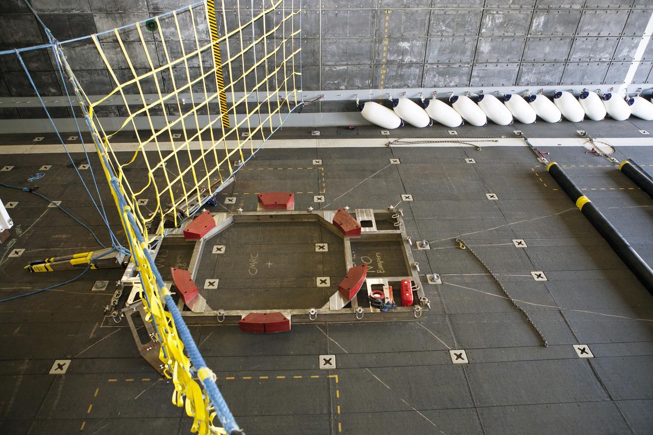 SAN DIEGO, Calif. – Ground support equipment is secured in the well deck of the USS Anchorage at Naval Base San Diego in California. The equipment will be used during recovery of the Orion crew module after its first flight test. Before launch of Orion on a Delta IV Heavy rocket from Cape Canaveral Air Force Station in Florida, NASA, Lockheed Martin and U.S. Navy personnel will head out to sea in the USS Anchorage and the USNS Salvor, a salvage ship, and wait for splashdown of the Orion crew module in the Pacific Ocean. The Ground Systems Development and Operations Program will lead the recovery efforts. Orion is the exploration spacecraft designed to carry astronauts to destinations not yet explored by humans, including an asteroid and Mars. It will have emergency abort capability, sustain the crew during space travel and provide safe re-entry from deep space return velocities. The first unpiloted flight test of Orion is scheduled to launch in December atop a United Launch Alliance Delta IV Heavy rocket and in 2018 on NASA’s Space Launch System rocket. For more information, visit http://www.nasa.gov/orion. Photo credit: NASA/Dimitri Gerondidakis