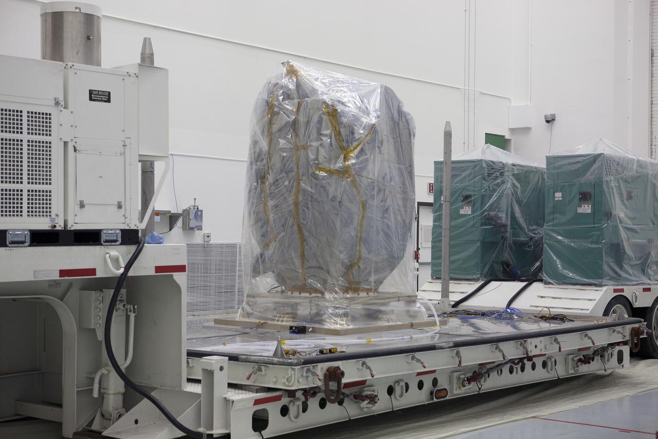 CAPE CANAVERAL, Fla. – Preparations are underway to lift NOAA’s Deep Space Climate Observatory spacecraft, or DSCOVR, wrapped in plastic, from its transportation pallet at the Astrotech payload processing facility in Titusville, Florida, near Kennedy Space Center. DSCOVR is a partnership between NOAA, NASA and the U.S. Air Force. DSCOVR will maintain the nation's real-time solar wind monitoring capabilities which are critical to the accuracy and lead time of NOAA's space weather alerts and forecasts. Launch is currently scheduled for January 2015 aboard a SpaceX Falcon 9 v 1.1 launch vehicle from Cape Canaveral Air Force Station, Florida. To learn more about DSCOVR, visit http://www.nesdis.noaa.gov/DSCOVR. Photo credit: NASA/Kim Shiflett
