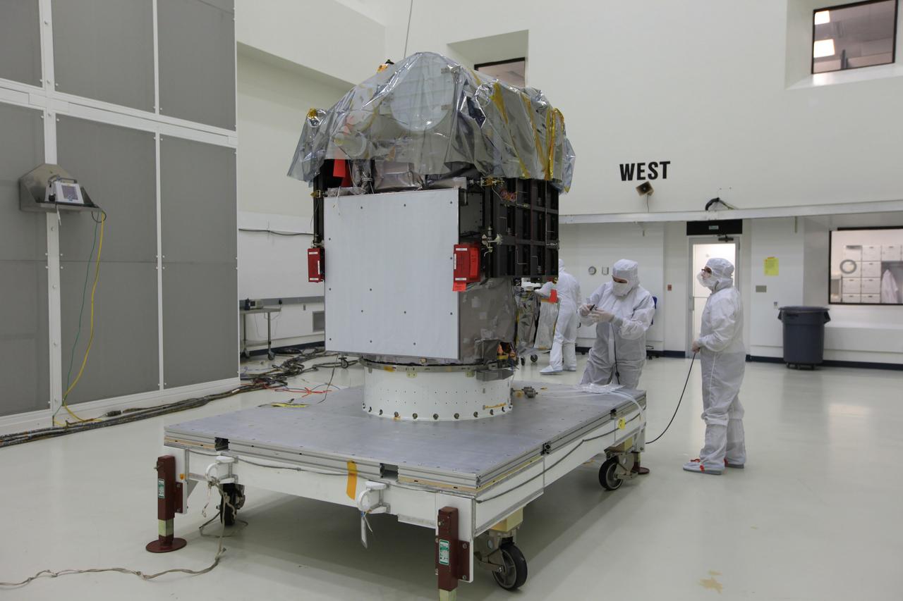 CAPE CANAVERAL, Fla. – NOAA’s Deep Space Climate Observatory spacecraft, or DSCOVR, has been uncovered and is ready for processing in the high bay of Building 1 at the Astrotech payload processing facility in Titusville, Florida, near Kennedy Space Center. DSCOVR is a partnership between NOAA, NASA and the U.S. Air Force. DSCOVR will maintain the nation's real-time solar wind monitoring capabilities which are critical to the accuracy and lead time of NOAA's space weather alerts and forecasts. Launch is currently scheduled for January 2015 aboard a SpaceX Falcon 9 v 1.1 launch vehicle from Cape Canaveral Air Force Station, Florida. To learn more about DSCOVR, visit http://www.nesdis.noaa.gov/DSCOVR. Photo credit: NASA/Kim Shiflett