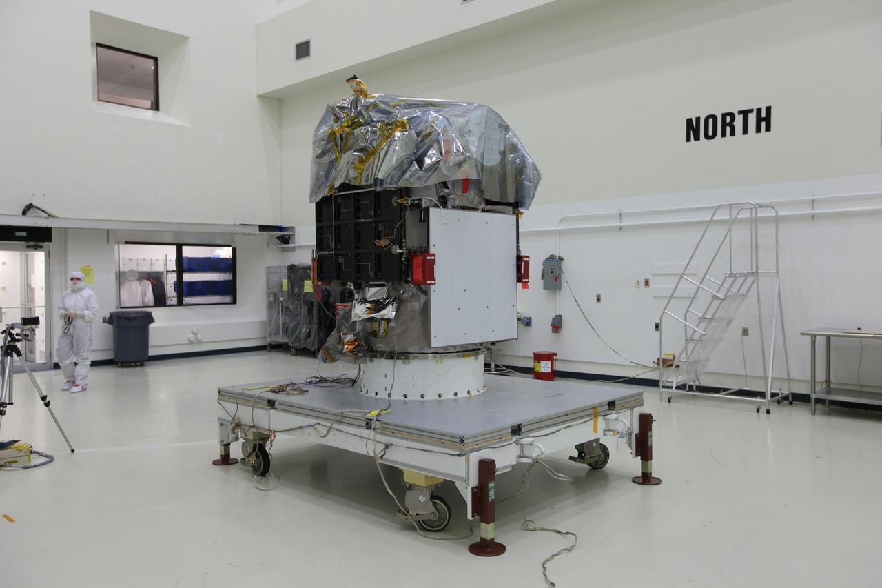 CAPE CANAVERAL, Fla. – NOAA’s Deep Space Climate Observatory spacecraft, or DSCOVR, has been uncovered and is ready for processing in the high bay of Building 1 at the Astrotech payload processing facility in Titusville, Florida, near Kennedy Space Center. DSCOVR is a partnership between NOAA, NASA and the U.S. Air Force. DSCOVR will maintain the nation's real-time solar wind monitoring capabilities which are critical to the accuracy and lead time of NOAA's space weather alerts and forecasts. Launch is currently scheduled for January 2015 aboard a SpaceX Falcon 9 v 1.1 launch vehicle from Cape Canaveral Air Force Station, Florida. To learn more about DSCOVR, visit http://www.nesdis.noaa.gov/DSCOVR. Photo credit: NASA/Kim Shiflett