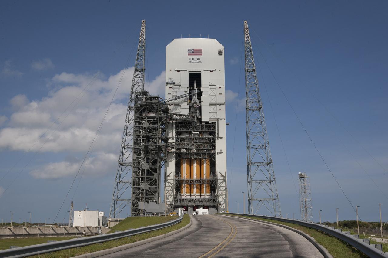 CAPE CANAVERAL, Fla. – With access doors at Space Launch Complex 37 opened, the Orion and Delta IV Heavy stack is visible in its entirety inside the Mobile Service Tower where the vehicle is undergoing launch preparations. Orion will make its first flight test on Dec. 4 with a morning launch atop the United Launch Alliance Delta IV Heavy. The spacecraft will orbit the Earth twice, including one loop that will reach 3,600 miles above Earth. No one will be aboard Orion for this flight test, but the spacecraft is being designed and built to carry astronauts to deep space destinations such as an asteroid. Photo credit: NASA/Kim Shiflett