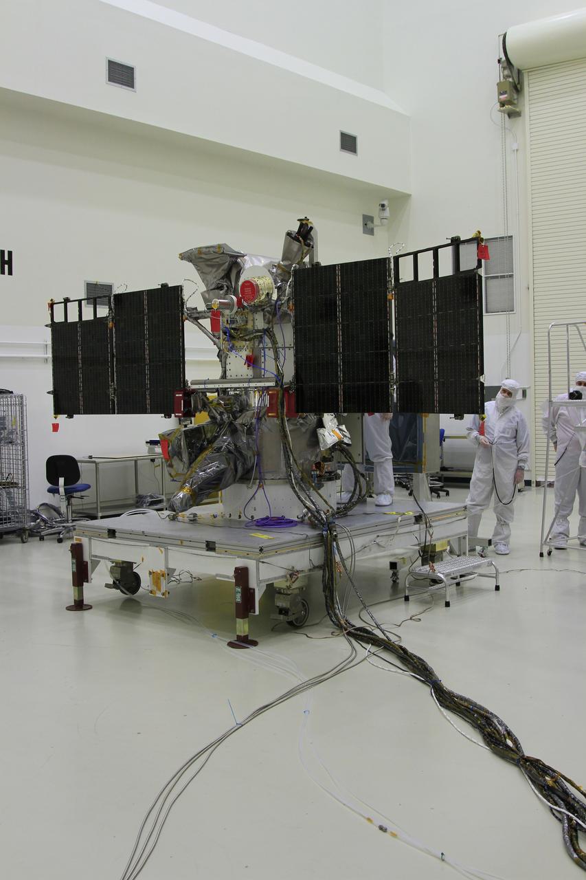 CAPE CANAVERAL, Fla. – Workers deploy the solar arrays on NOAA’s Deep Space Climate Observatory spacecraft, or DSCOVR, in the Building 1 high bay at the Astrotech payload processing facility in Titusville, Florida, near Kennedy Space Center. DSCOVR is a partnership between NOAA, NASA and the U.S. Air Force. DSCOVR will maintain the nation's real-time solar wind monitoring capabilities which are critical to the accuracy and lead time of NOAA's space weather alerts and forecasts. Launch is targeted for early 2015 aboard a SpaceX Falcon 9 v 1.1 launch vehicle from Cape Canaveral Air Force Station, Florida. To learn more about DSCOVR, visit http://www.nesdis.noaa.gov/DSCOVR. Photo credit: NASA/Ben Smegelsky