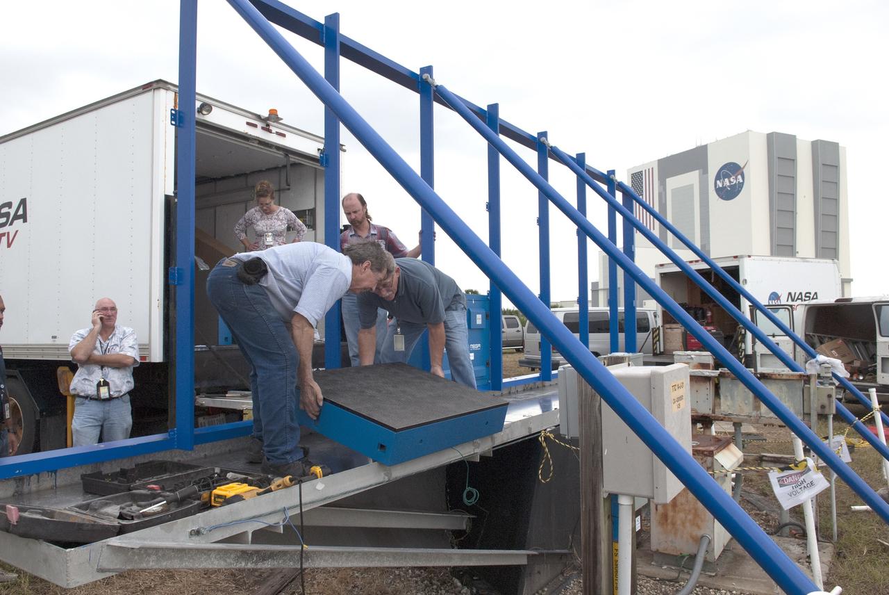 CAPE CANAVERAL, Fla. – At NASA's Kennedy Space Center in Florida, assembly has begun on the first of 24 light emitting diode LED panels for installation in the new countdown clock at the spaceport's Press Site. The new modern, multimedia display will be similar to the screens seen at sporting venues. The new screen will be nearly 26 feet wide by 7 feet high, a foot taller than the original clock.    The historic countdown clock was designed by Kennedy engineers and built by space center technicians before Apollo 12 in 1969. NASA has requested to acquire the countdown clock from the agency’s Artifact Working Group at the agency's Headquarters for likely display at the Kennedy Space Center Visitor Complex. For more information on the countdown clock, go to http://go.nasa.gov/10Zku10. Photo credit: NASA/Jim Grossmann