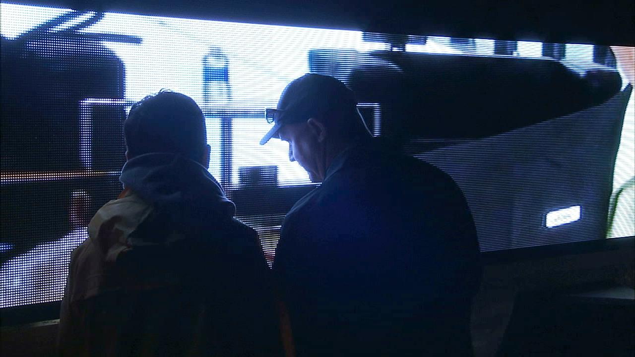 CAPE CANAVERAL, Fla. – At NASA's Kennedy Space Center in Florida, the new countdown clock at the spaceport's Press Site is being tested. The modern, multimedia display is similar to the screens seen at sporting venues. The new screen will be nearly 26 feet wide by 7 feet high, a foot taller than the original clock. The historic countdown clock was designed by Kennedy engineers and built by space center technicians before Apollo 12 in 1969. NASA has requested to acquire the countdown clock from the agency’s Artifact Working Group at the agency's Headquarters for display at the Kennedy Space Center Visitor Complex. For more information on the countdown clock, go to http://go.nasa.gov/10Zku10. Photo credit: NASA/Ben Smegelsky