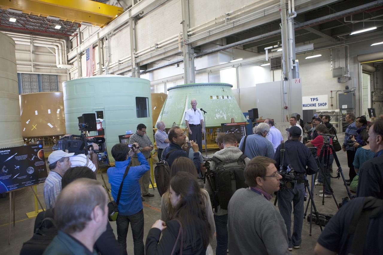CAPE CANAVERAL, Fla. – At NASA's Kennedy Space Center in Florida, members of the news media are briefed on the agency's Space Launch System SLS Program by former astronaut Brian Duffy who is now vice president and program manager of Exploration Systems at Alliant Techsystems Inc. ATK. The briefing took place in the spaceport's Booster Fabrication Facility BFF. During the Space Shuttle Program, the facility was used for processing forward segments and aft skirts for the solid rocket boosters. The BFF will serve a similar role for the SLS.    Orion is the exploration spacecraft designed to carry astronauts to destinations not yet explored by humans, including an asteroid and Mars. It will have emergency abort capability, sustain the crew during space travel and provide safe re-entry from deep space return velocities. The first unpiloted flight test of Orion is scheduled to launch Dec. 4, 2014 atop a United Launch Alliance Delta IV Heavy rocket, and in 2018 on NASA’s Space Launch System rocket. For more information, visit www.nasa.gov/orion Photo credit: NASA/Kim Shiflett