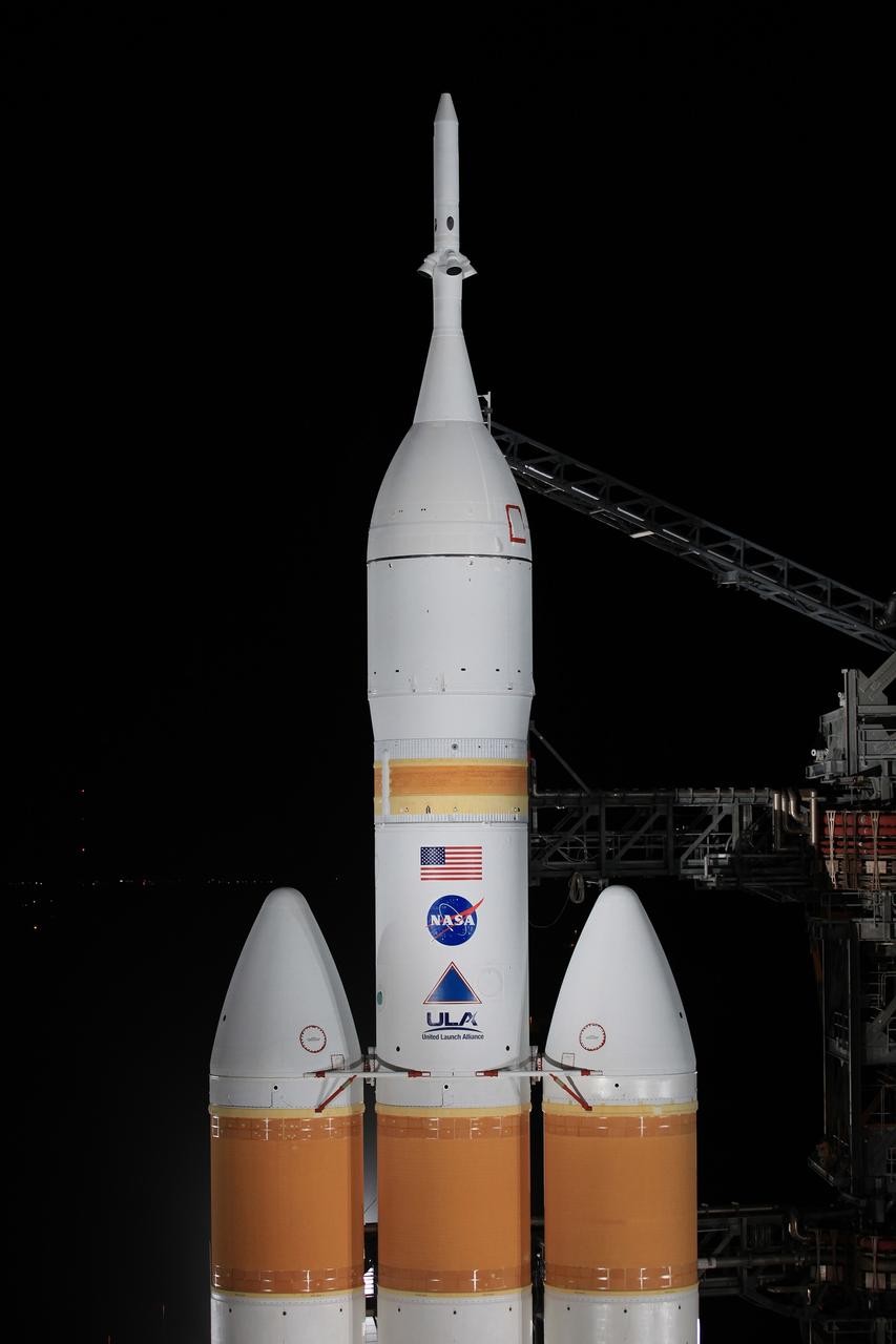 CAPE CANAVERAL, Fla. – The launch gantry is rolled back to reveal NASA's Orion spacecraft mounted atop a United Launch Alliance Delta IV Heavy rocket at Cape Canaveral Air Force Station's Space Launch Complex 37. Orion is NASA’s new spacecraft built to carry humans, designed to allow us to journey to destinations never before visited by humans, including an asteroid and Mars. For more information, visit www.nasa.gov/orion Photo credit: NASA/Kim Shiflett