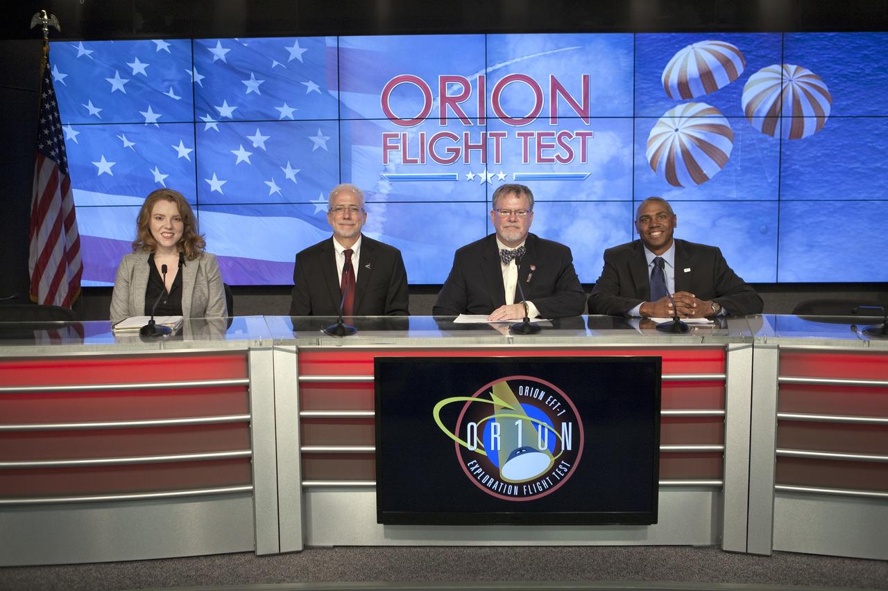 CAPE CANAVERAL, Fla. – In the Kennedy Space Center’s Press Site auditorium, agency and industry leaders spoke to members of the news media as the Orion spacecraft and its Delta IV Heavy rocket were being prepared for launch. From left are: Brandi Dean of NASA Public Affairs, Mark Geyer, Orion program manager, Mike Hawes, Lockheed Martin Orion Program manager, and Ron Fortson, United Launch Alliance director of mission management. Orion is the exploration spacecraft designed to carry astronauts to destinations not yet explored by humans, including an asteroid and Mars. It will have emergency abort capability, sustain the crew during space travel and provide safe re-entry from deep space return velocities. The first unpiloted flight test of Orion is scheduled to launch Dec. 4, 2014 atop a United Launch Alliance Delta IV Heavy rocket, and in 2018 on NASA’s Space Launch System rocket. For more information, visit www.nasa.gov/orion Photo credit: NASA/Kim Shiflett