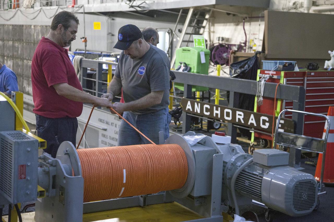SAN DIEGO, Calif. – NASA, Lockheed Martin and U.S. Navy personnel are preparing the well deck of the USS Anchorage in the Pacific Ocean near the Orion recovery site ahead of the first flight test. The team is preparing for recovery of the crew module, forward bay cover and parachutes on its return from space and splashdown in the Pacific Ocean. The Ground Systems Development and Operations Program is leading the recovery efforts.    The first unpiloted flight test of Orion is scheduled to launch this week atop a United Launch Alliance Delta IV Heavy rocket. During its two-orbit, 4.5-hour flight, Orion will venture 3,600 miles in altitude and travel nearly 60,000 miles before returning to Earth for a splashdown in the Pacific Ocean. For more information, visit http://www.nasa.gov/orion. Photo credit: NASA/Cory Huston