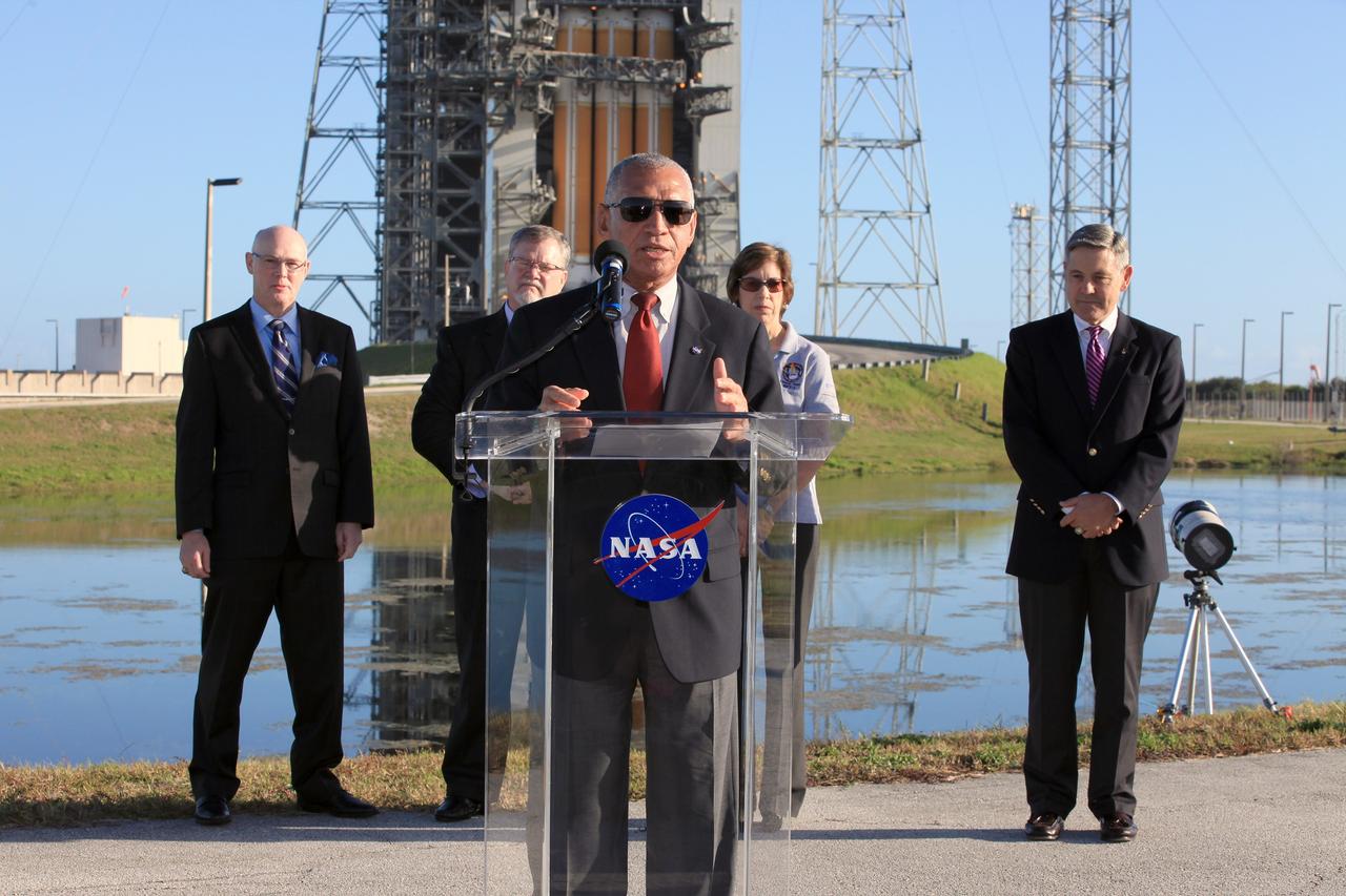 CAPE CANAVERAL, Fla. – At Cape Canaveral Air Force Station's Launch Complex 37, NASA Administrator Charlie Bolden speaks to members of the news media as the Orion spacecraft and its United Launch Alliance Delta IV Heavy rocket were being prepared for launch. Behind Bolden, from the left, are United Launch Alliance CEO Tory Bruno, Lockheed Martin Orion Program Manager Mike Hawes, Johnson Space Center Director Ellen Ochoa and Kennedy Space Center Director Bob Cabana. For more information, visit www.nasa.gov/orion. Photo credit: NASA/Kim Shiflett