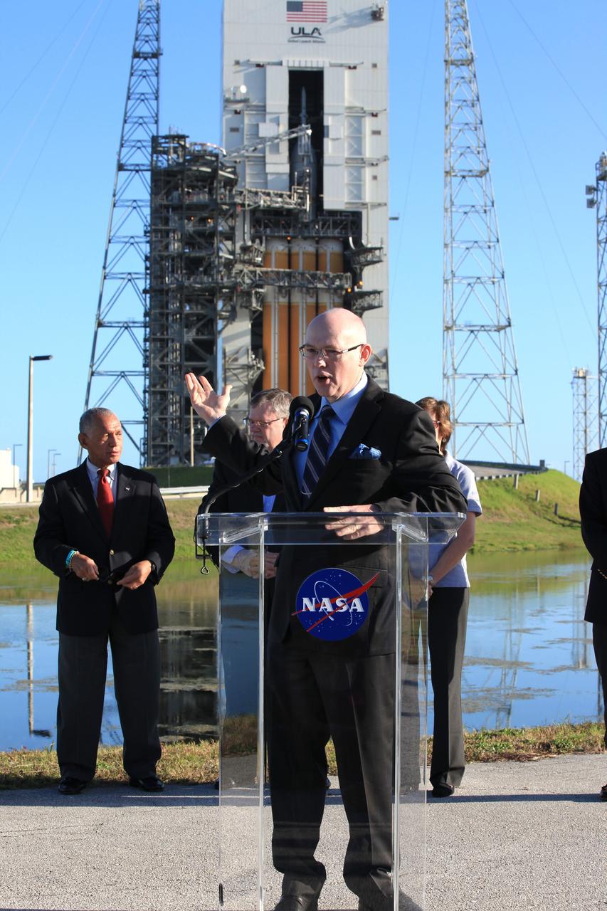 CAPE CANAVERAL, Fla. – At Cape Canaveral Air Force Station's Launch Complex 37, United Launch Alliance CEO Tory Bruno speaks to members of the news media as the Orion spacecraft and its United Launch Alliance Delta IV Heavy rocket were being prepared for launch. Behind Bruno, from the left, are NASA Administrator Charlie Bolden, Lockheed Martin Orion Program Manager Mike Hawes and Johnson Space Center Director Ellen Ochoa. For more information, visit www.nasa.gov/orion. Photo credit: NASA/Kim Shiflett