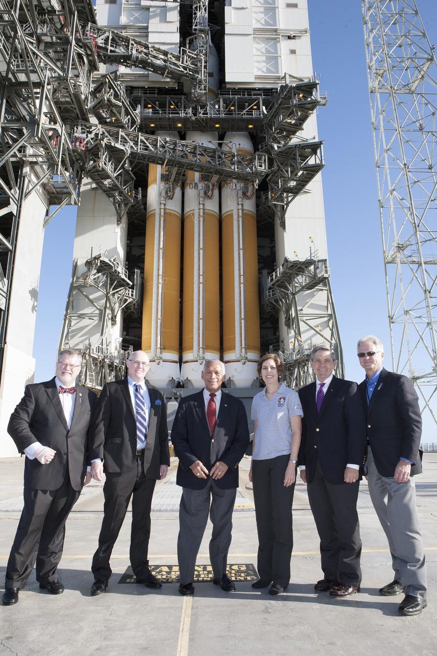 CAPE CANAVERAL, Fla. – At Cape Canaveral Air Force Station's Launch Complex 37, NASA and industry leaders pose in front of the United Launch Alliance Delta IV heavy rocket poised to launch the Orion spacecraft on its first flight test. For more information, visit www.nasa.gov/orion. Photo credit: NASA/Kim Shiflett