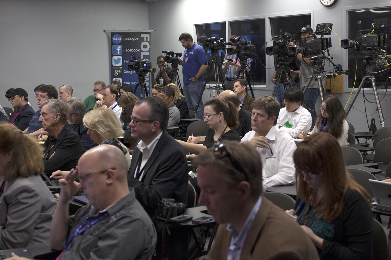 CAPE CANAVERAL, Fla. -- In the Kennedy Space Center’s Press Site auditorium, members of the news media listen as agency and industry leaders updated progress as the Orion spacecraft and its Delta IV Heavy rocket were being prepared for launch. For more information, visit www.nasa.gov/orion. Photo credit: NASA/Frankie Martin